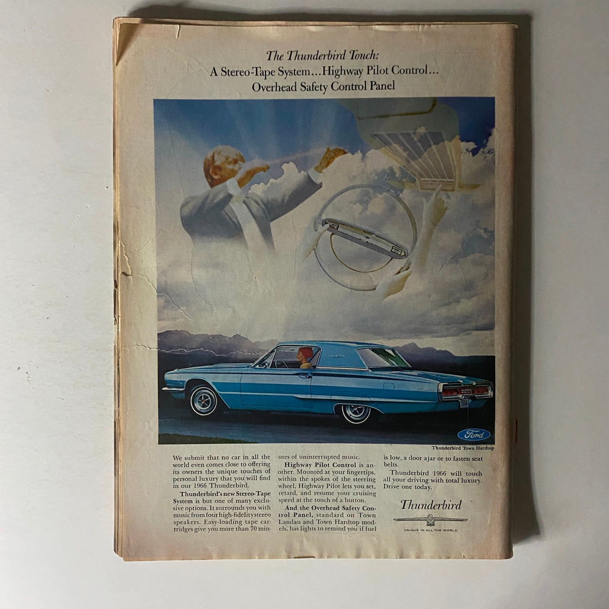 The back cover of Time Magazine April 8, 1966 Vol 87 No. 14 showcasing an advertisement for the 1966 Ford Thunderbird, featuring a blue car and a depiction of advanced stereo-tape technology.