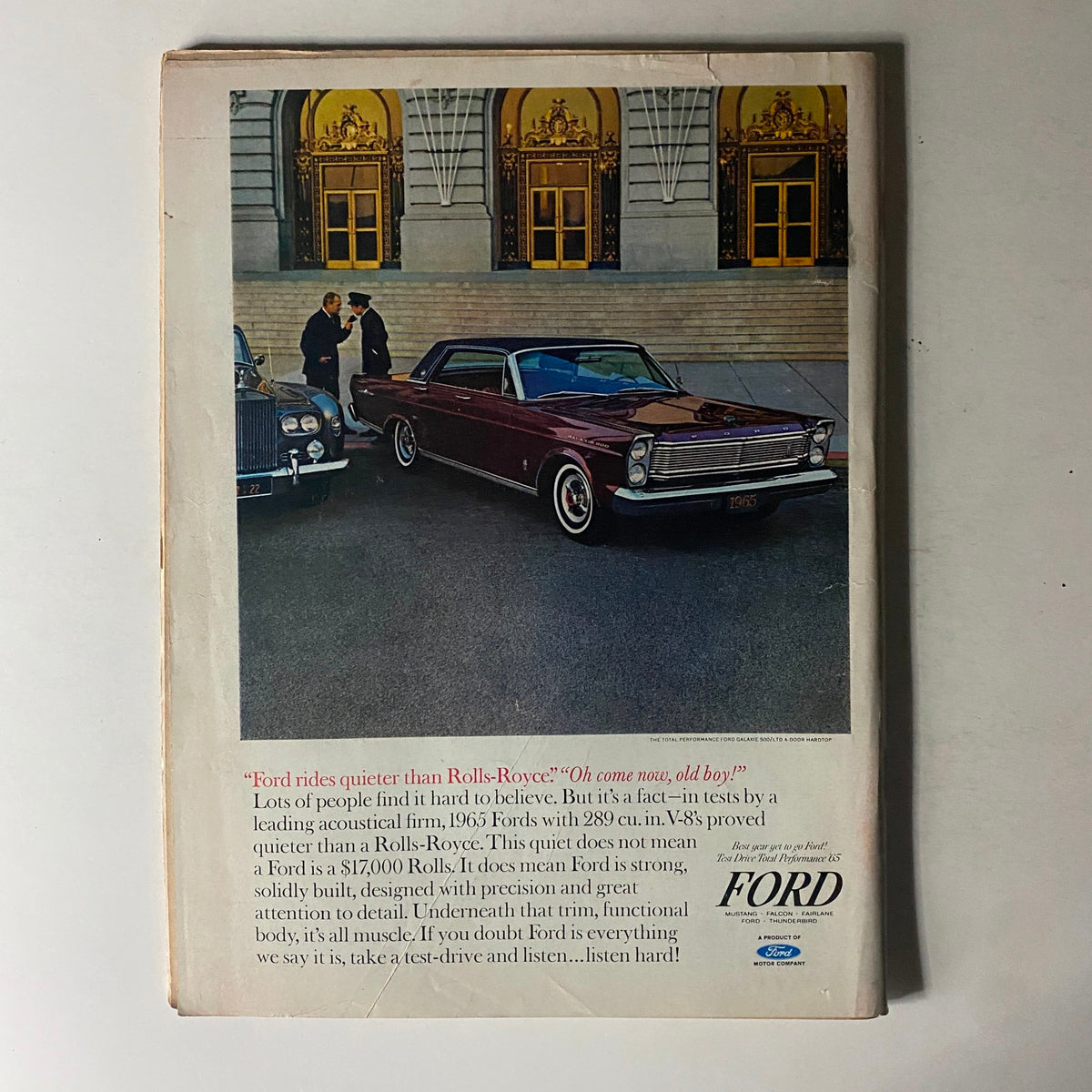 Back cover of Time Magazine February 5, 1965 featuring an advertisement for Ford cars with a classic car and a scenic background, promoting the quietness of Ford vehicles compared to Rolls-Royce.