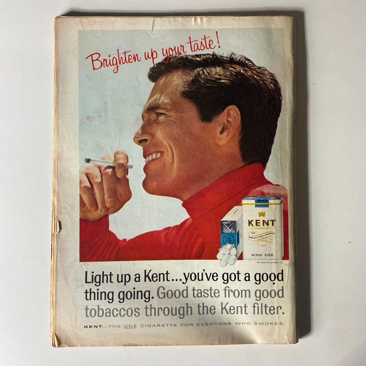 Back cover of the Time Magazine, dated October 8, 1965, featuring an advertisement for Kent cigarettes. The magazine serves as a historical artifact reflecting the style and marketing of the mid-20th century.