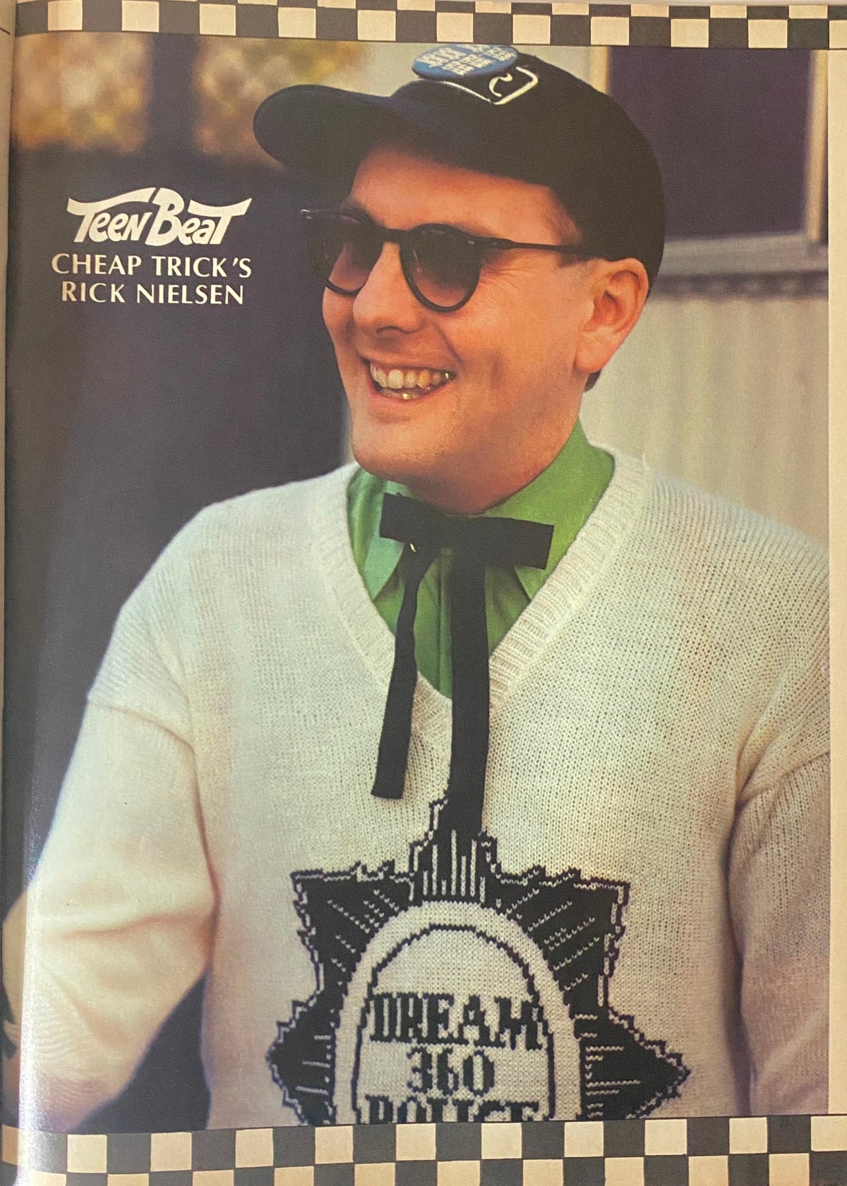 Teen Beat Magazine September 1980 cover featuring Rick Nielsen of Cheap Trick, smiling and wearing a stylish sweater with a unique design.