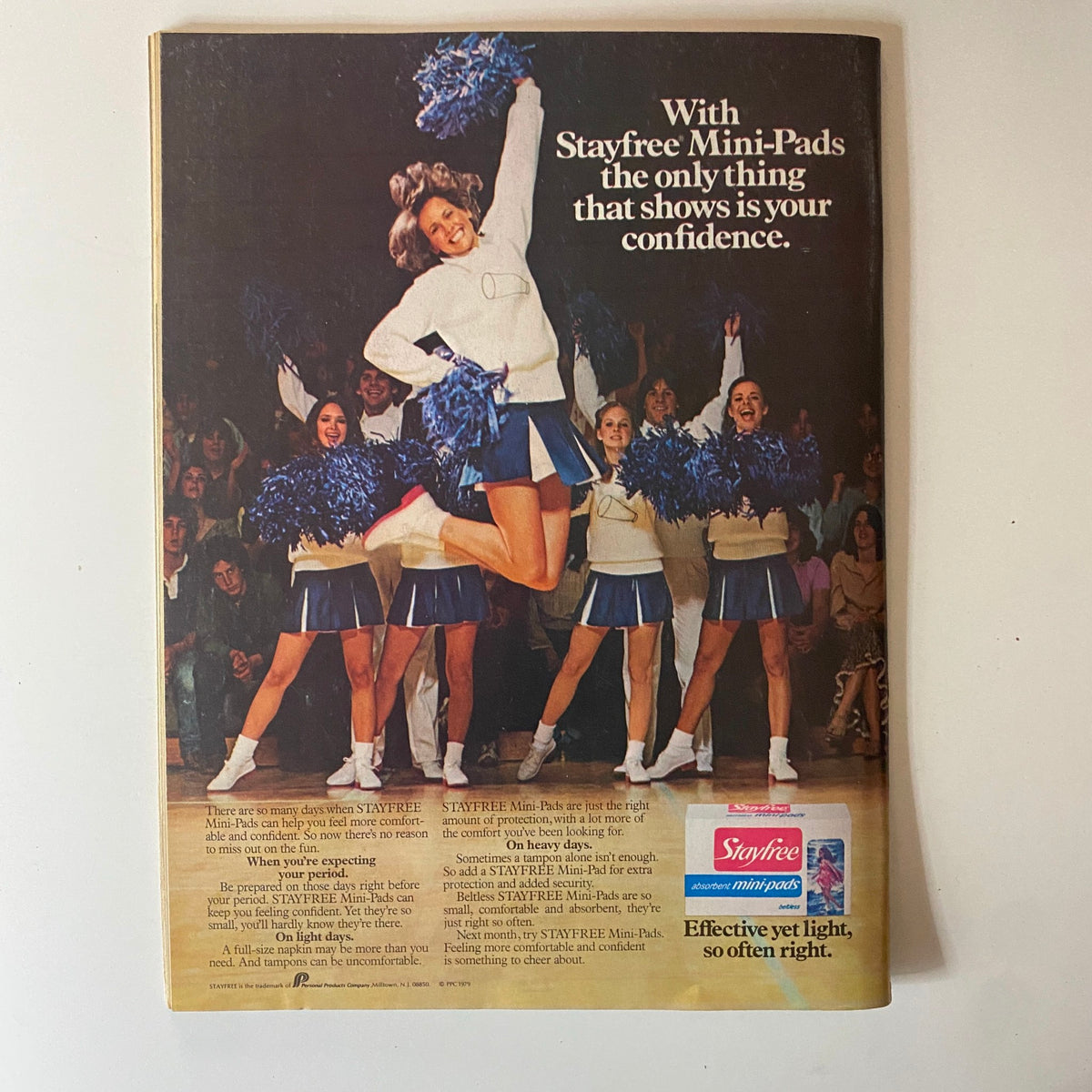 Teen Beat Magazine September 1980 advertisement showcasing a confident cheerleader with pom-poms, promoting Stayfree Mini-Pads.
