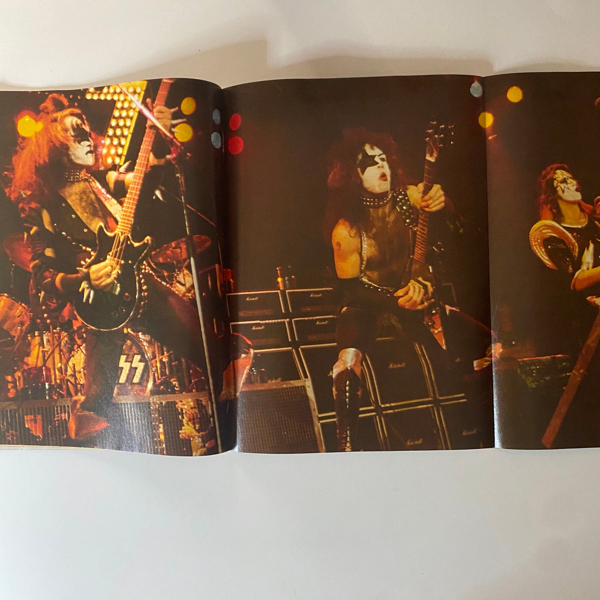 Live performance images of KISS from Teen Beat Magazine October 1980 showcasing the iconic band.