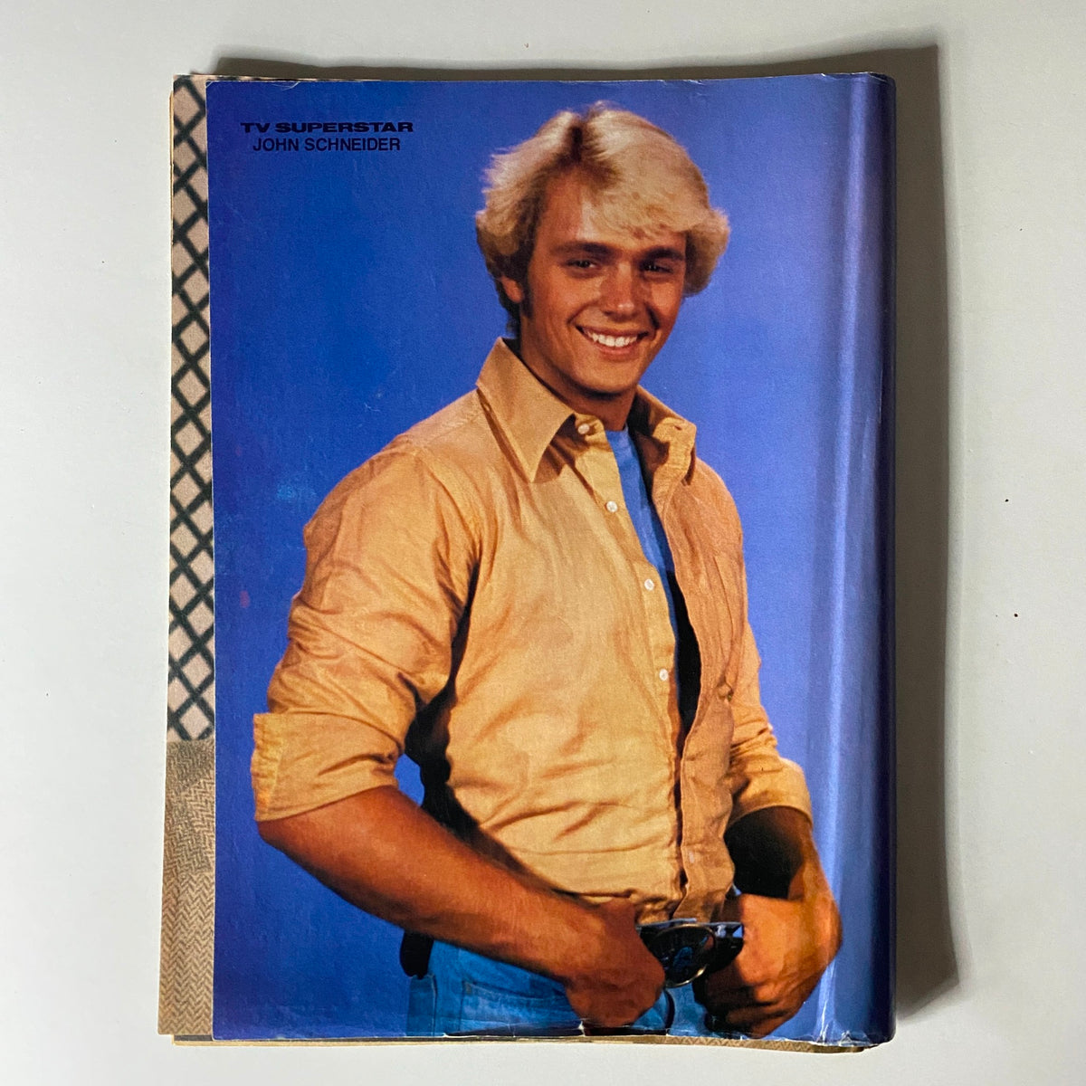 Cover of TV Superstar Magazine June 1980 featuring John Schneider, showcasing a smiling young man with blonde hair, wearing a light-colored shirt and blue jeans. This issue highlights iconic stars of the era, making it a collectible for vintage magazine enthusiasts.