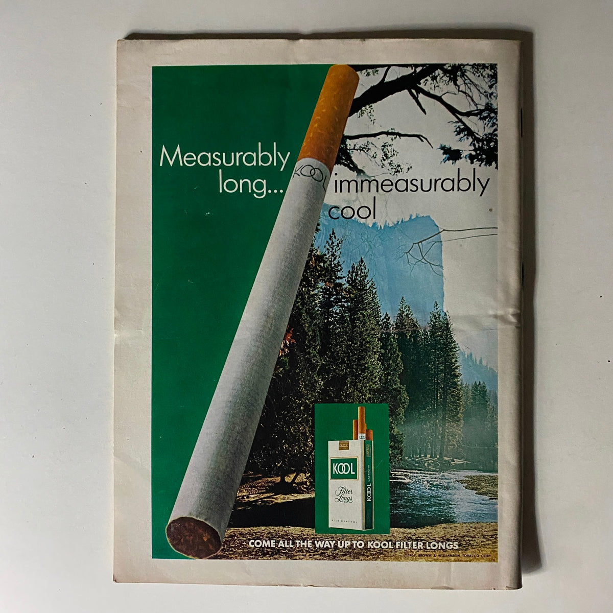 Vintage advertisement from Newsweek Magazine September 8, 1969 promoting Kool Filter Long cigarettes in a scenic outdoor setting.