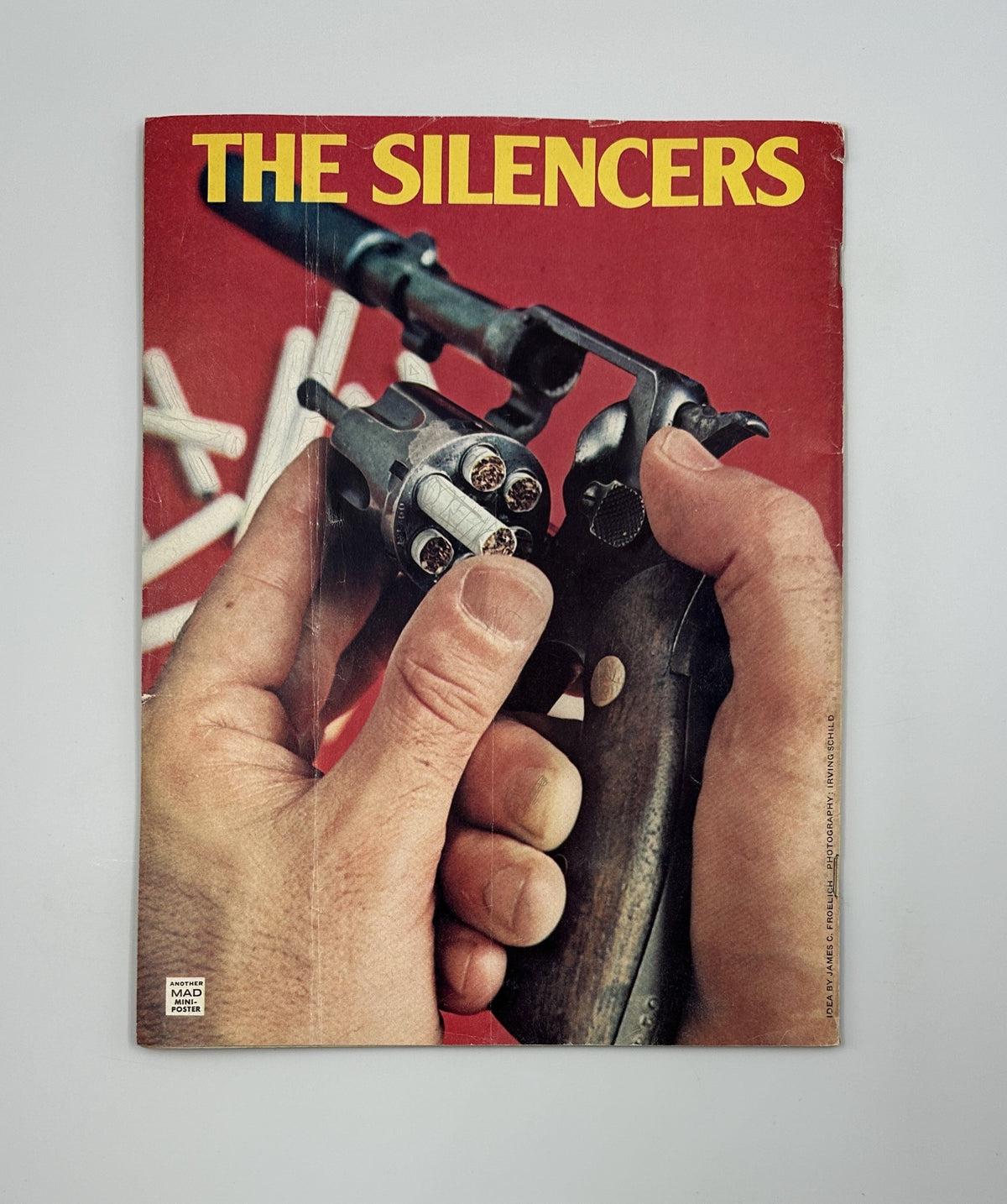 Cover of MAD Magazine No. 174 from April 1975 featuring a parody of the movie Death Wish, depicting a close-up of hands holding a revolver, showcasing the magazine's characteristic humor and satire.