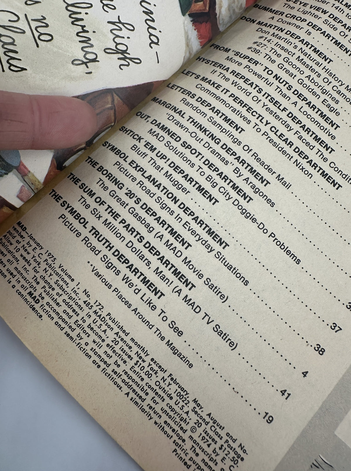Close-up of the table of contents from MAD Magazine No. 172, January 1975, showcasing featured departments including 'The Six Million Dollar Man' and various satirical segments.