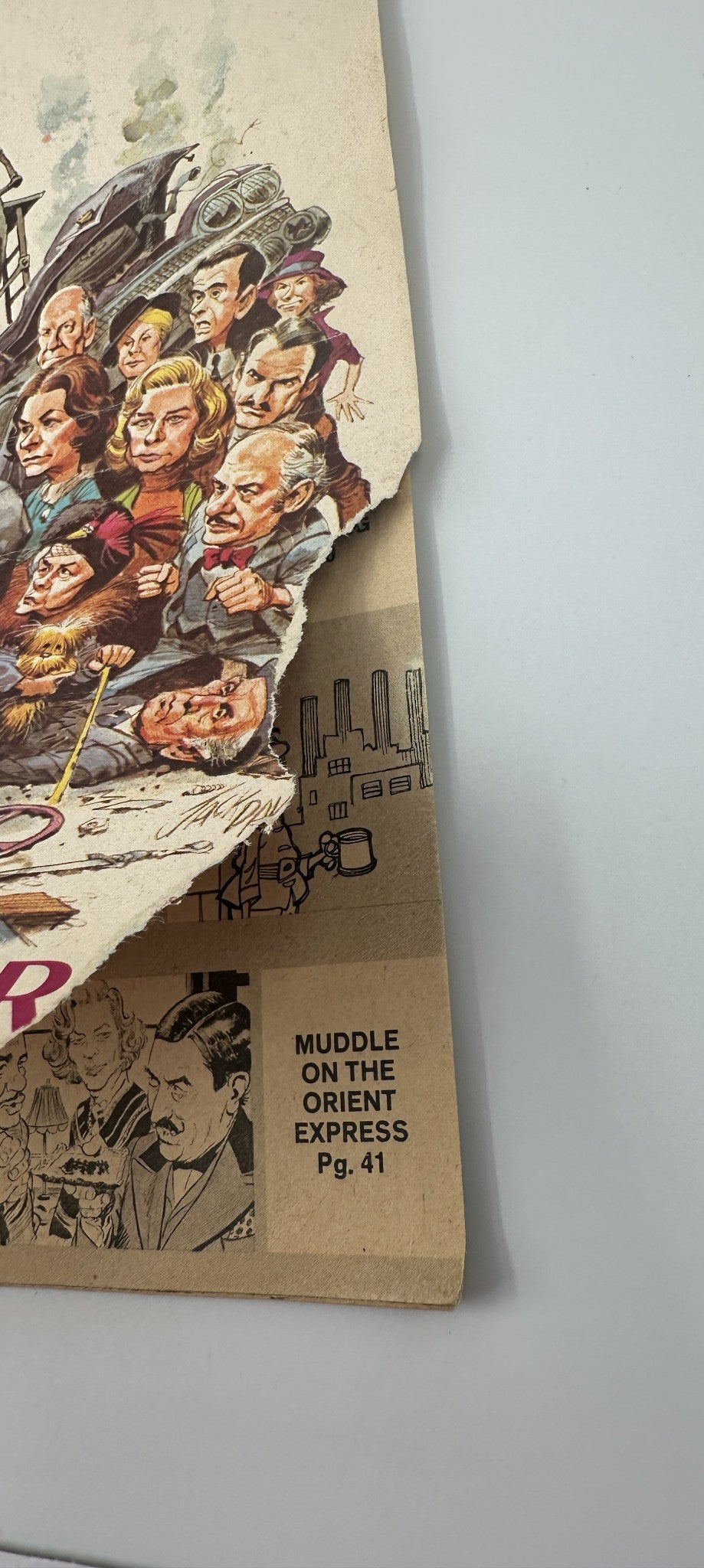 MAD Magazine No. 178 October 1975 image showing a folded corner highlighting the department 'Muddle On The Orient Express', depicting whimsical characters and satirical content.