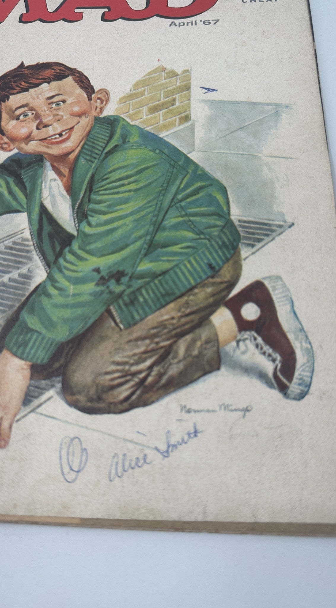 MAD Magazine No. 110 April 1967 cover featuring Alfred E. Neuman, depicting a boy in a green sweater and brown pants, with a playful expression.