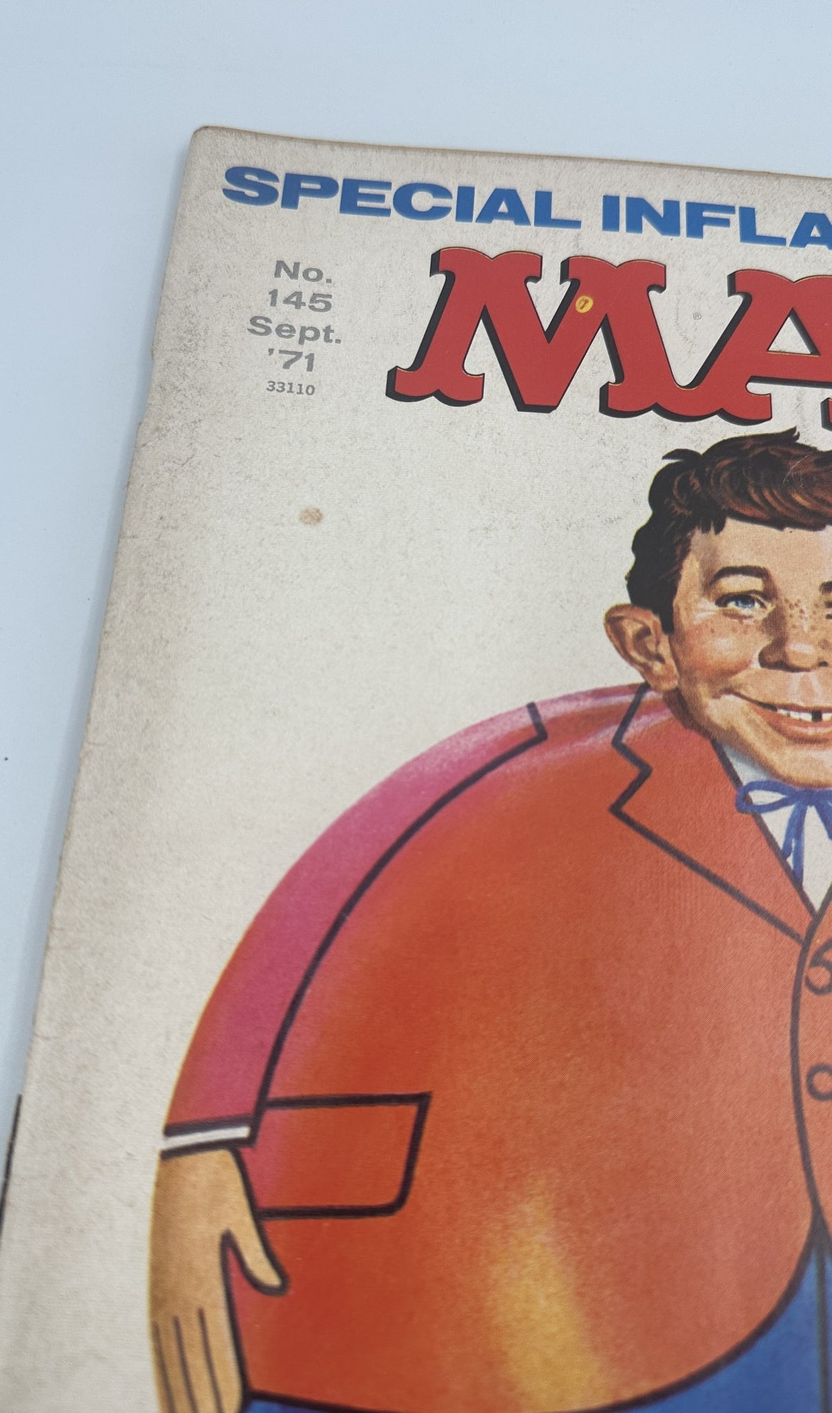 Close-up of the front cover of MAD Magazine No. 145 September 1971, highlighting the title and issue details in bold letters, including the publication date and price.