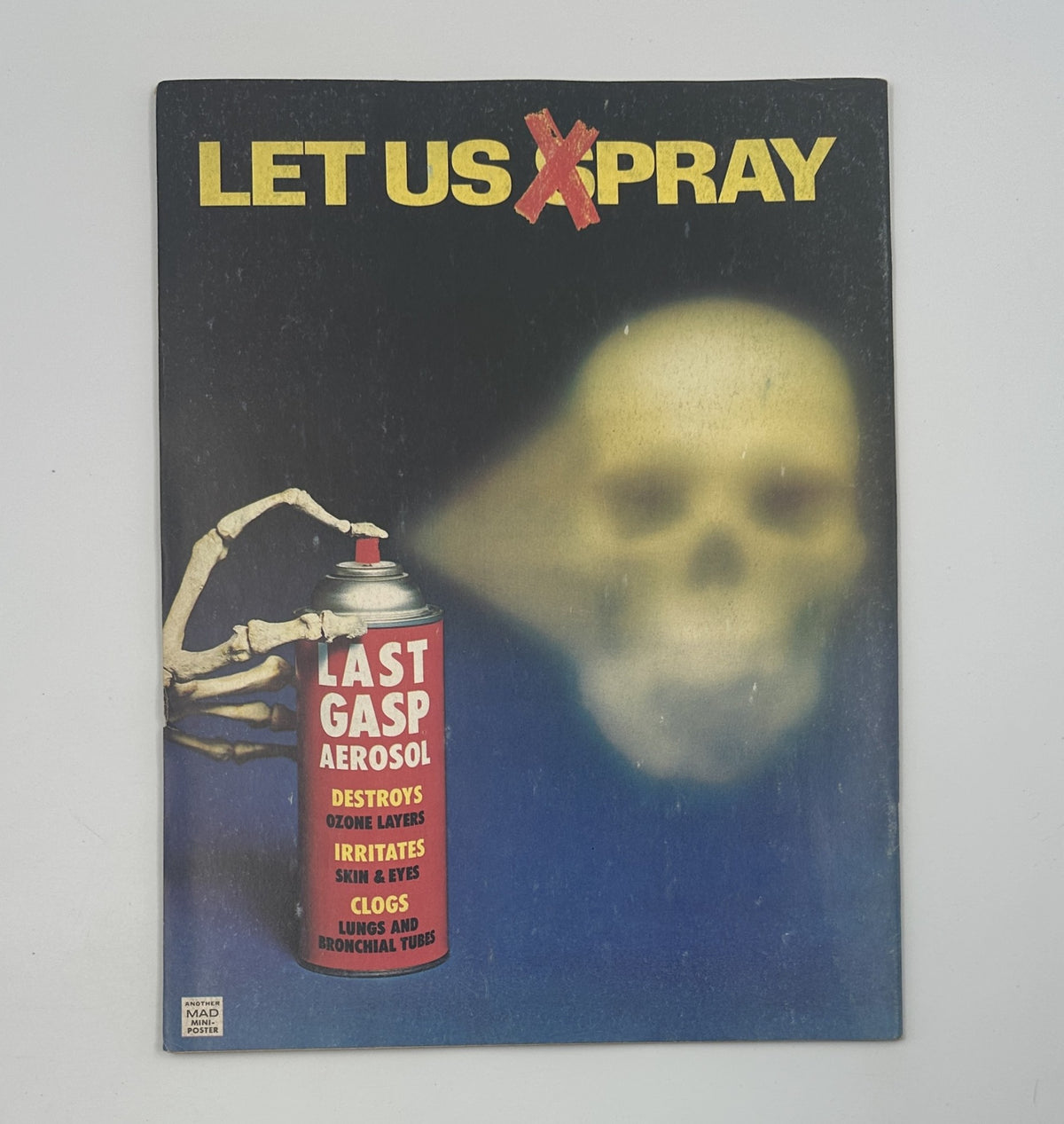 Cover of MAD Magazine No. 186, October 1976, titled 'LET US X PRAY' depicting a menacing skeleton holding a spray can labeled 'LAST GASP AEROSOL', highlighting dark humor and social commentary.
