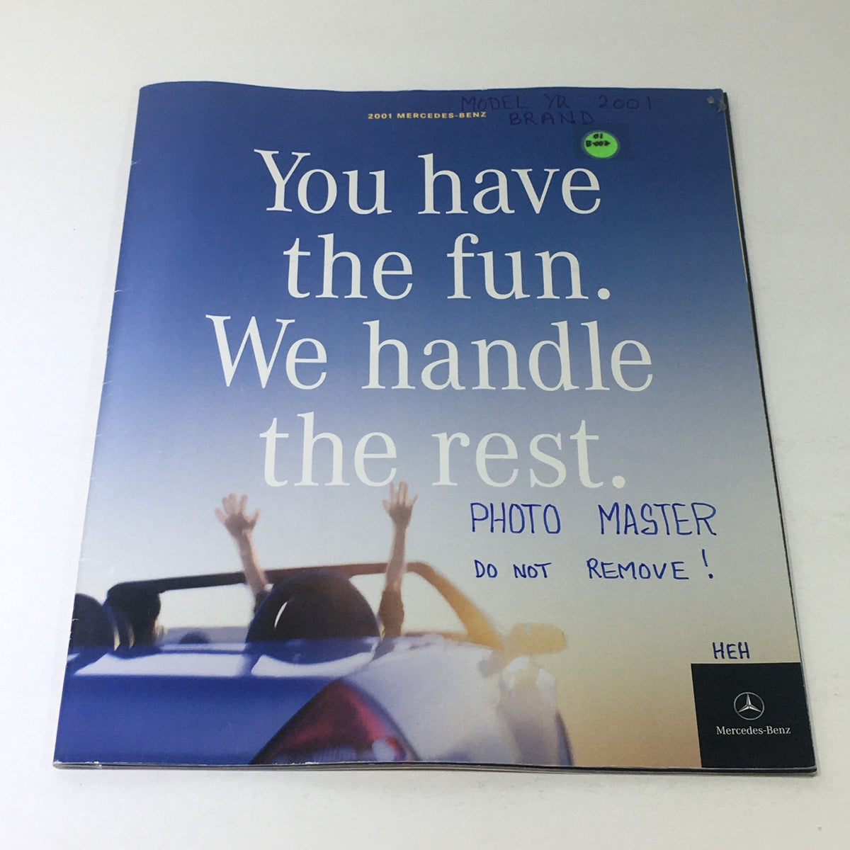 2001 Mercedes-Benz SLK-Class Dealership Car Auto Brochure Catalog cover featuring a cheerful graphic of a convertible with hands raised, promoting enjoyment and carefree driving.