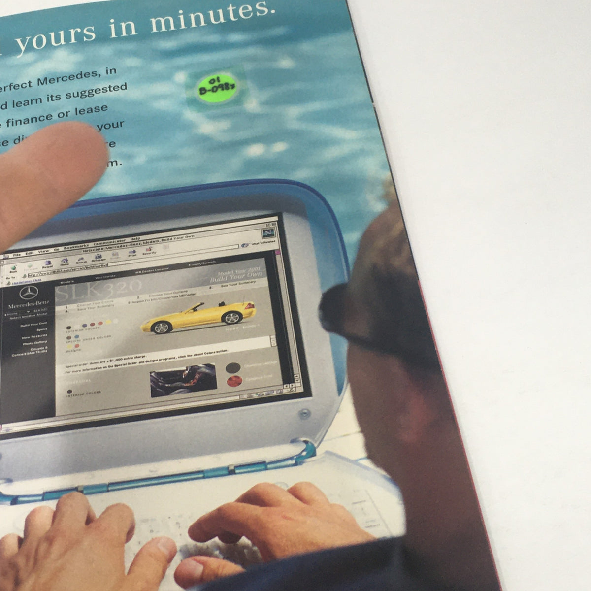 Close-up of a person using a computer to customize a 2001 Mercedes-Benz SLK-Class, showcasing the online ordering interface. 2001 Mercedes-Benz SLK-Class Dealership Car Auto Brochure Catalog.