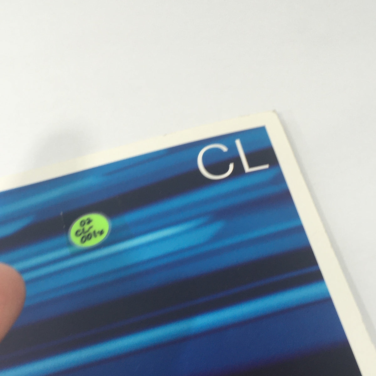 2002 Mercedes-Benz CL-Class Dealership Car Auto Brochure Catalog showing the cover with a close-up of a label with the text 'CL'.