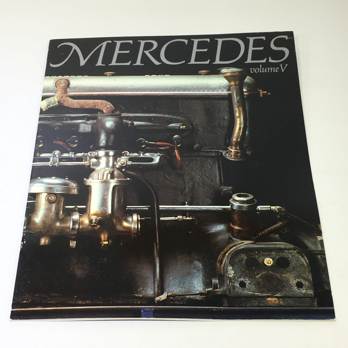 Cover of the 1982 Mercedes-Benz Volume V Dealership Car Auto Brochure Catalog showcasing automotive engineering and design.