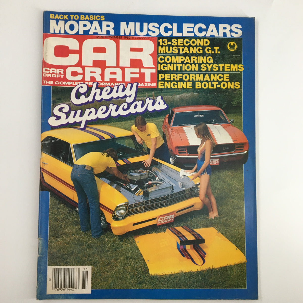 Cover of VTG Car Craft Magazine November 1982 featuring a yellow car with racers working on it, showcasing Chevrolet supercars and comparing ignition systems.