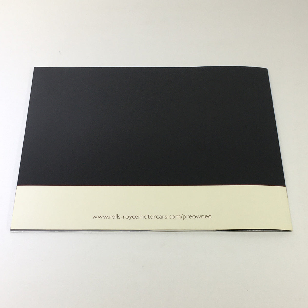 Back cover of the 2013 Rolls Royce Provenance Collection Dealership Car Auto Brochure, featuring simple design and company website.
