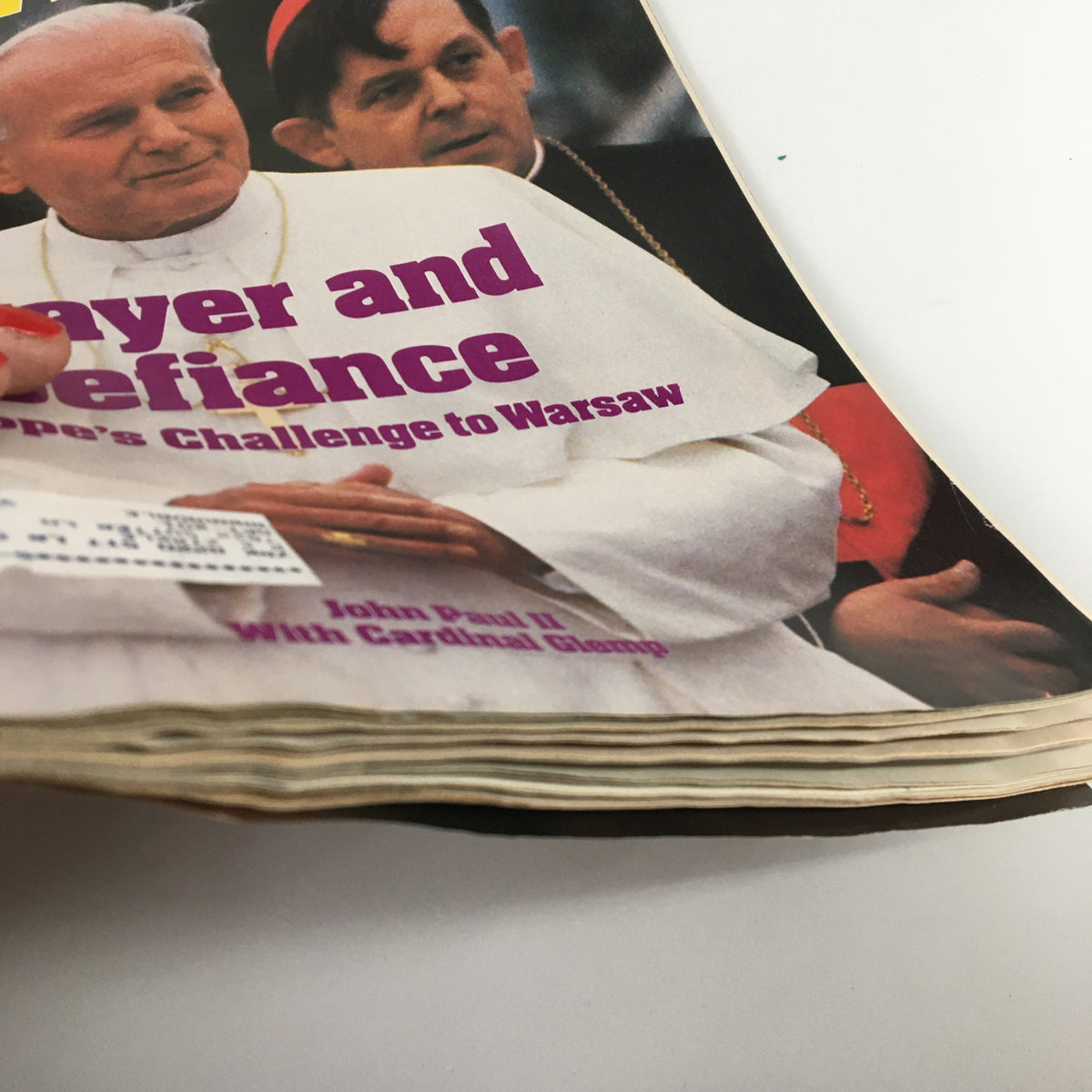 Close-up view of the cover of VTG Newsweek Magazine June 27 1983 highlighting Pope John Paul II and Cardinal Glemp with a focus on the title 'Prayer and Defiance'.