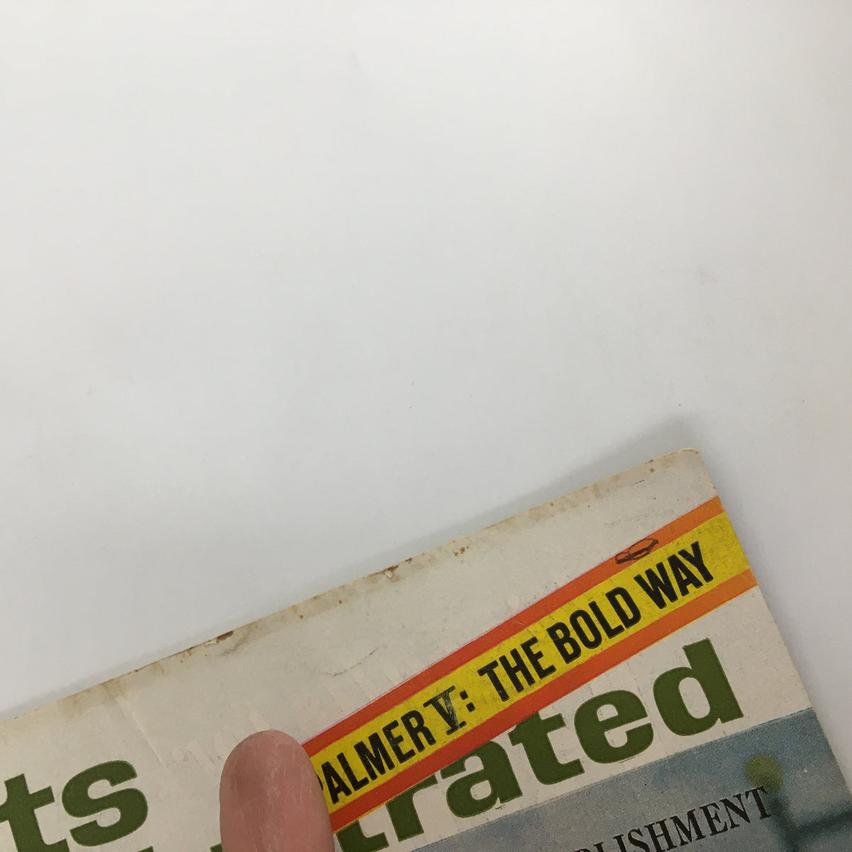 Close-up image of the Sports Illustrated magazine from August 12, 1963 showing the title 'PALMER V: THE BOLD WAY' on the tab at the top. This image highlights the vintage design and print details of the magazine.