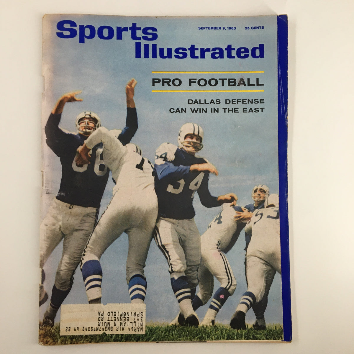 Cover of the Sports Illustrated magazine from September 9, 1963, titled 'Dallas Defense Can Win in East', featuring football players from the Dallas Cowboys celebrating on the field.