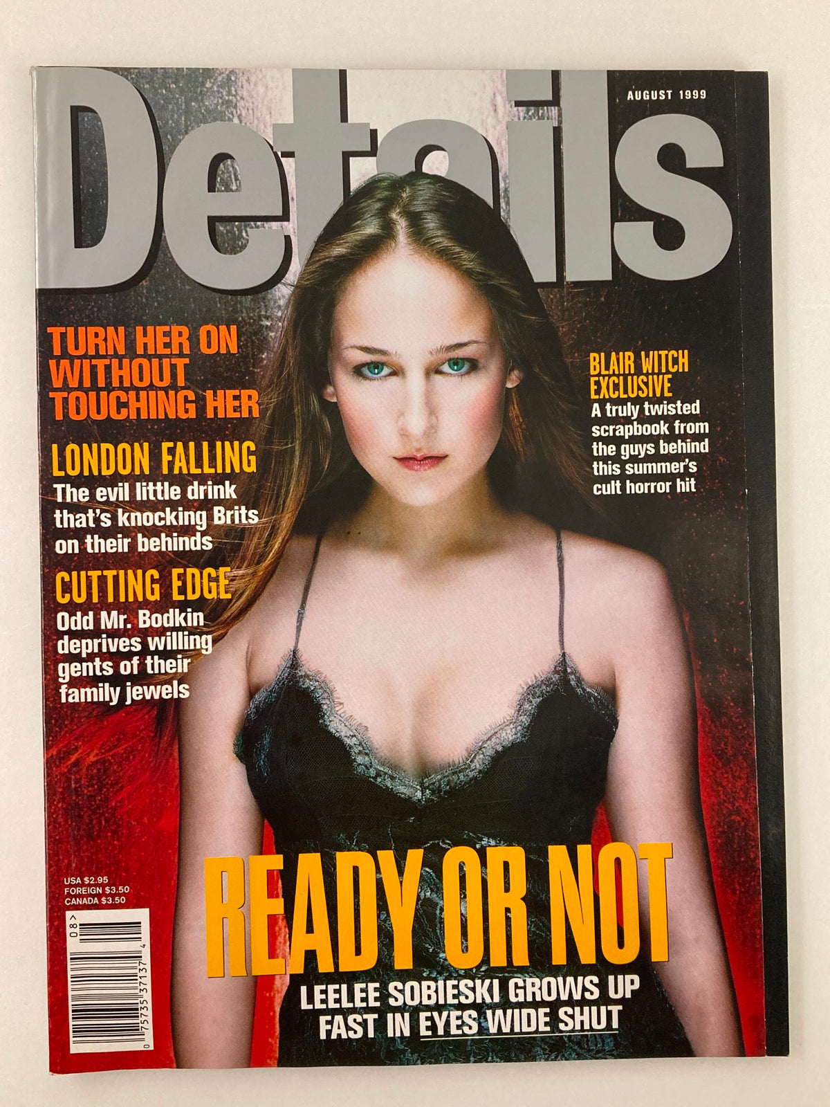 Details Magazine August 1999 featuring LeeLee Sobieski on the cover with striking eyes and an elegant gaze, encapsulating 90s fashion and Hollywood culture.