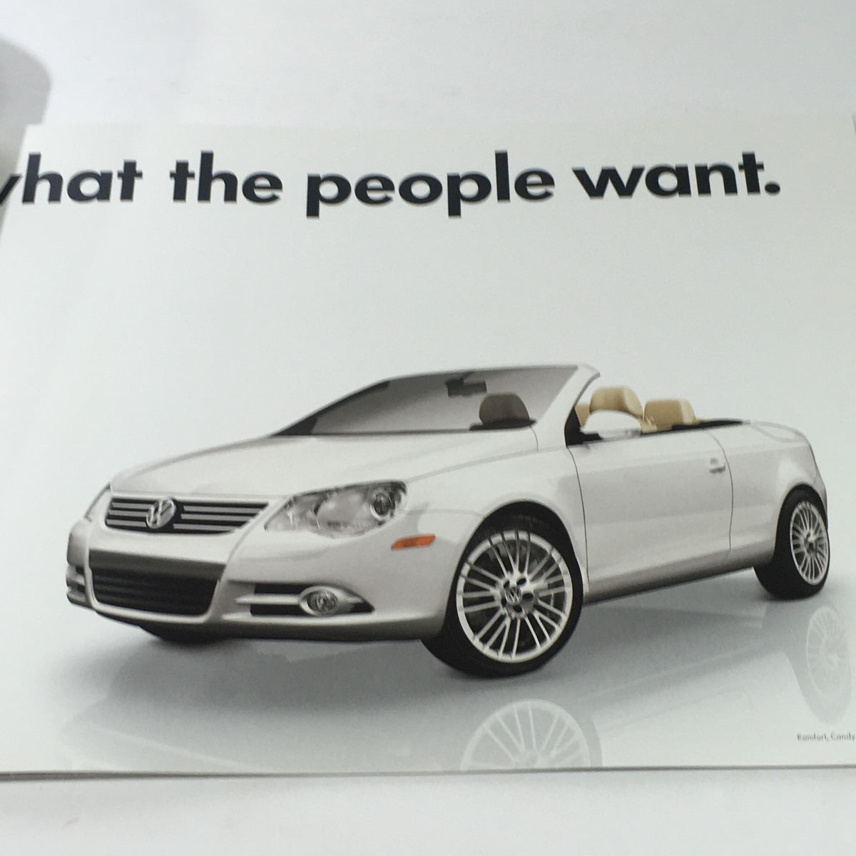 2010 Volkswagen Eos Dos Auto brochure page illustrating the convertible design and appealing aesthetic.