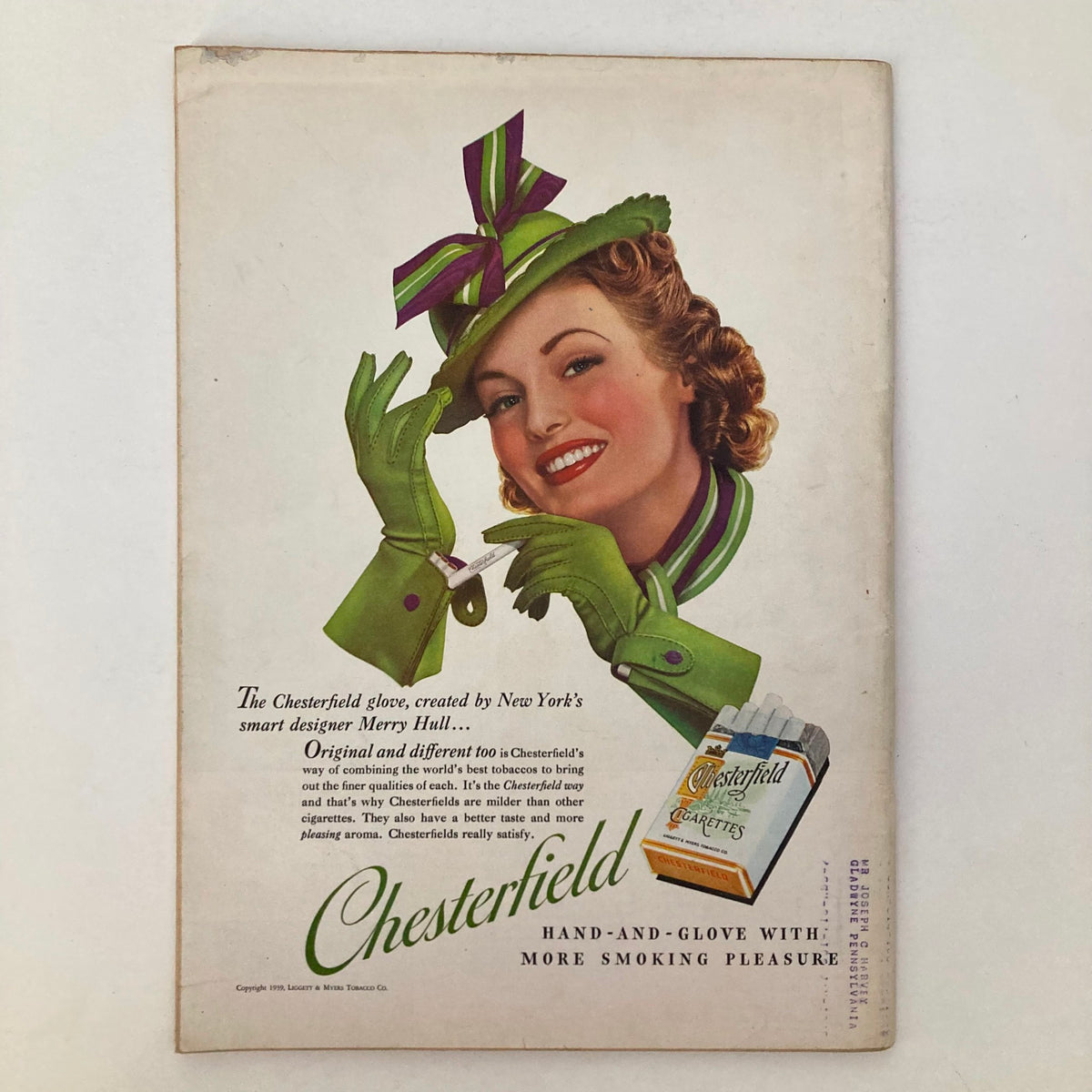 Back cover of Vintage Time Magazine May 1, 1939, featuring an advertisement for Chesterfield cigarettes with a smiling woman wearing stylish gloves.