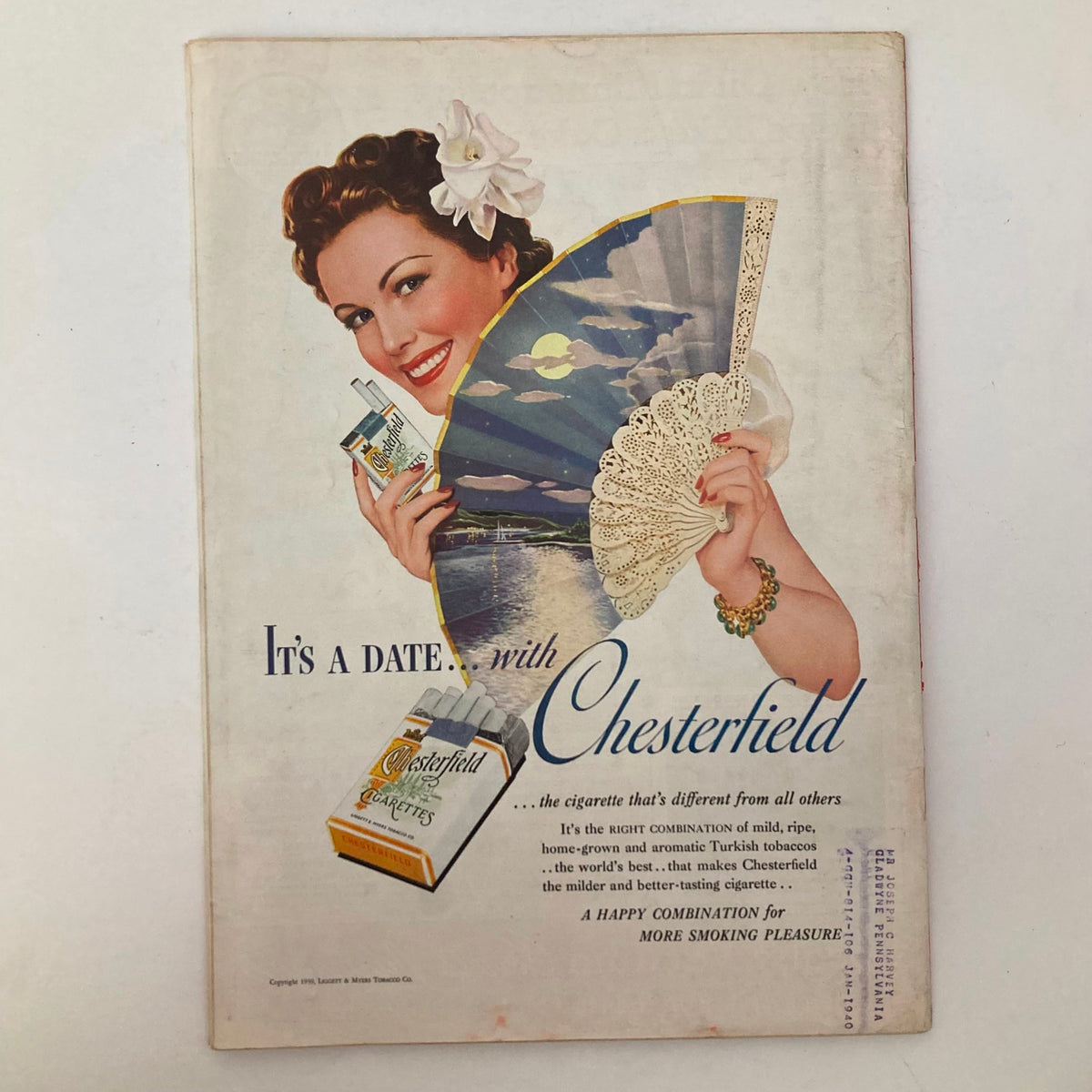 Back cover advertisement in Time Magazine August 21, 1939, promoting Chesterfield cigarettes with a vintage design featuring a woman holding a fan.