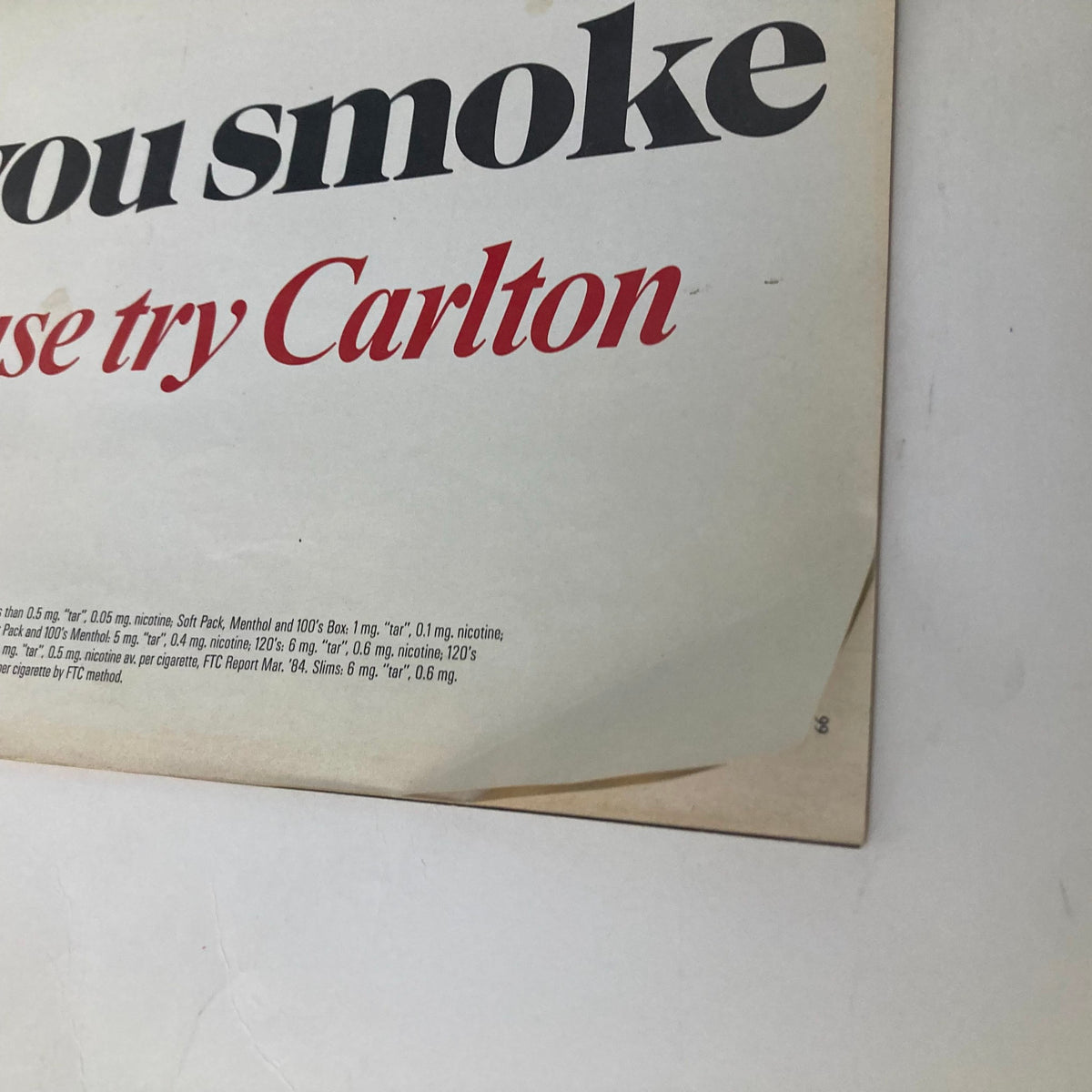 Detailed view of the back cover advertisement in VTG Newsweek Magazine January 7 1985, promoting Carlton cigarettes with a cautionary statement regarding smoking.