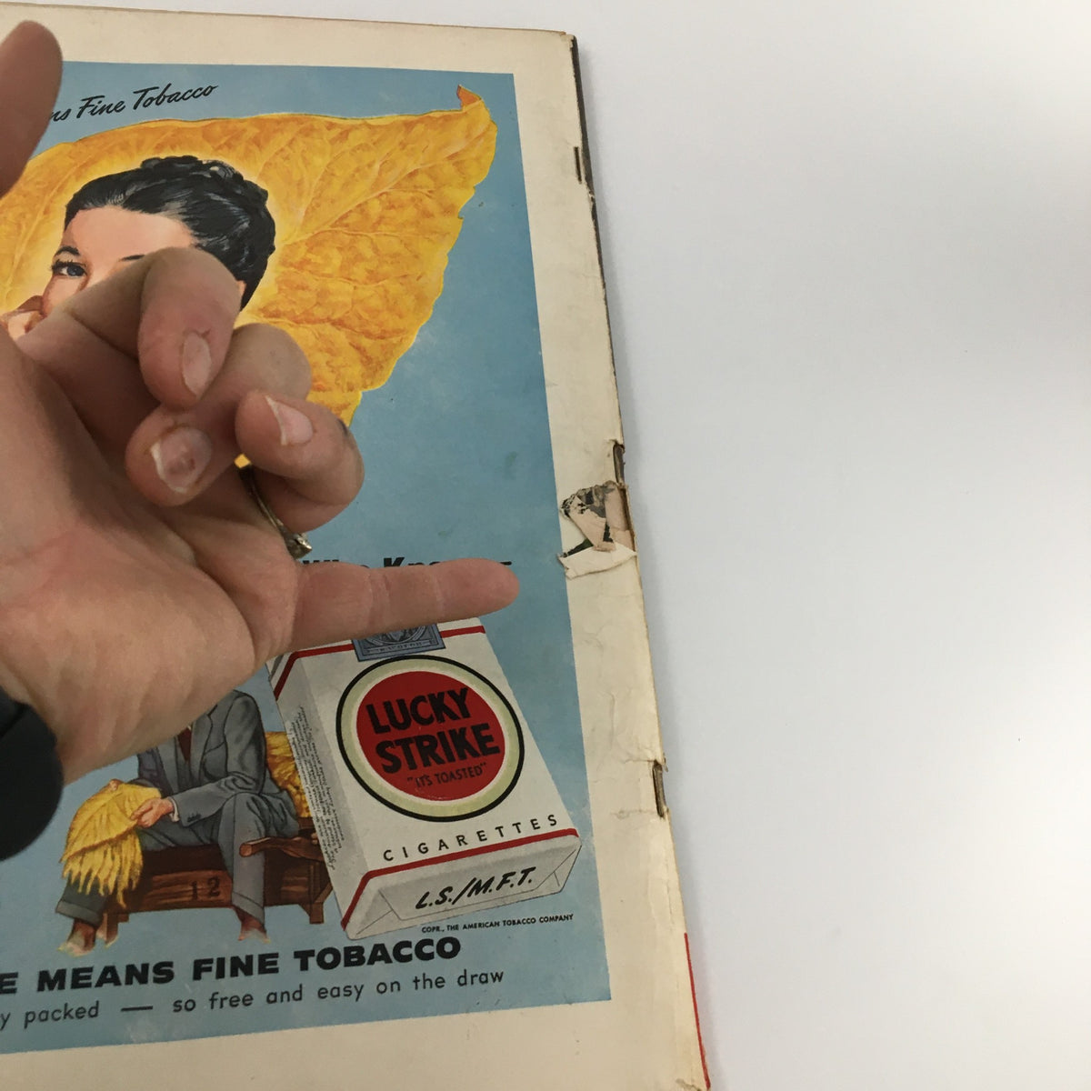 Close-up of a vintage Life Magazine cover from April 19, 1948, featuring advertising for Lucky Strike cigarettes alongside a woman's hand gesture, relevant to the War Memoirs of Winston Churchill.