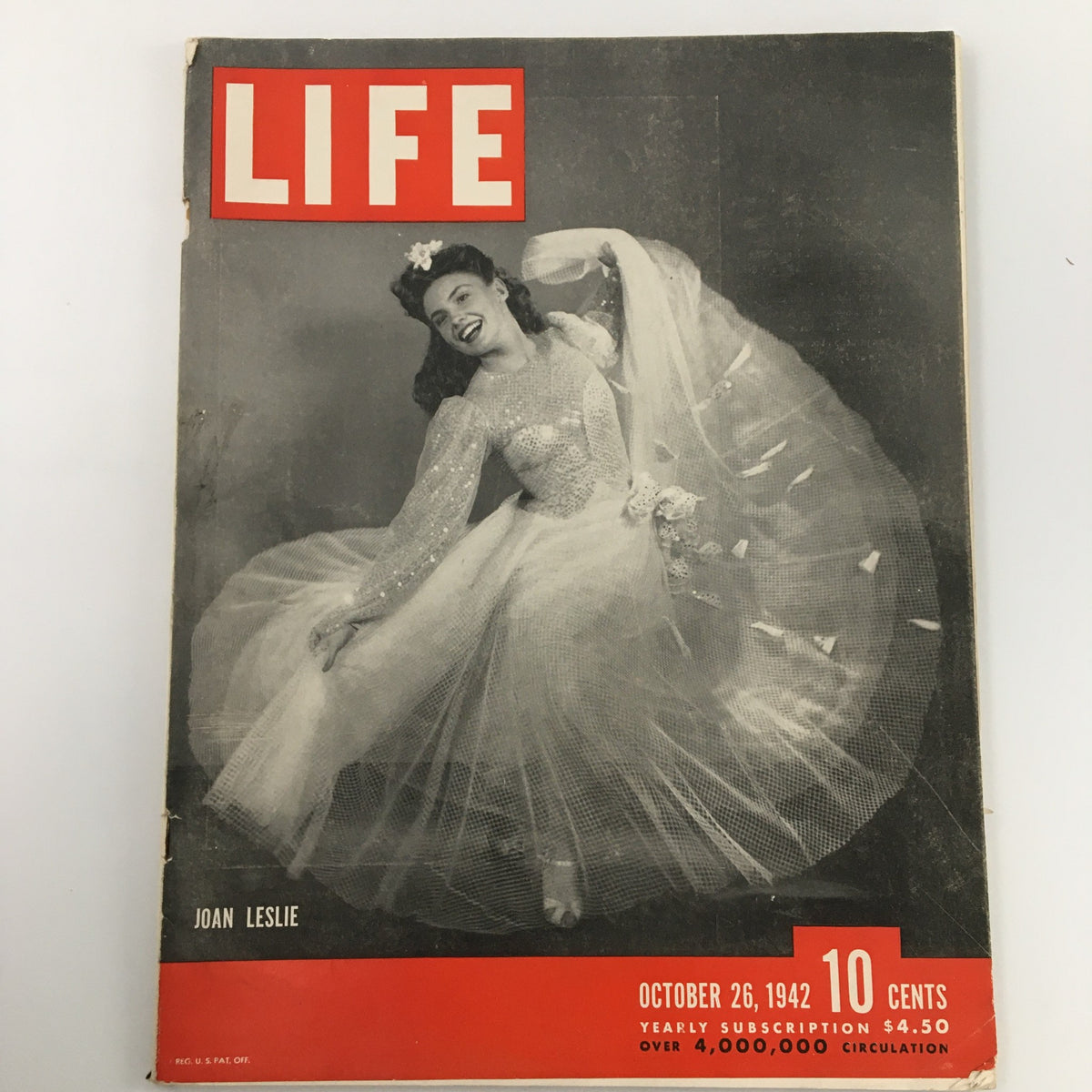 VTG Life Magazine cover from October 26, 1942 featuring Joan Leslie in a sparkling dress, showcasing vintage fashion and magazine history.