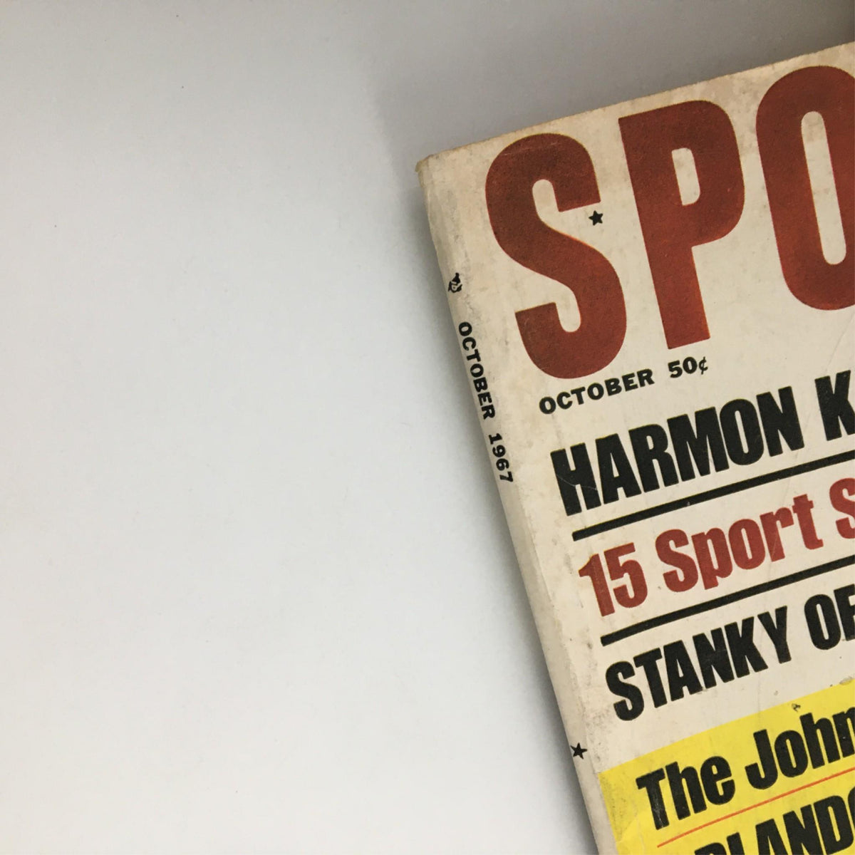Close-up view of Sport Magazine cover from October 1967 displaying the title and features on Harmon Killerbrew, Johnny Unitas, and sports humor.