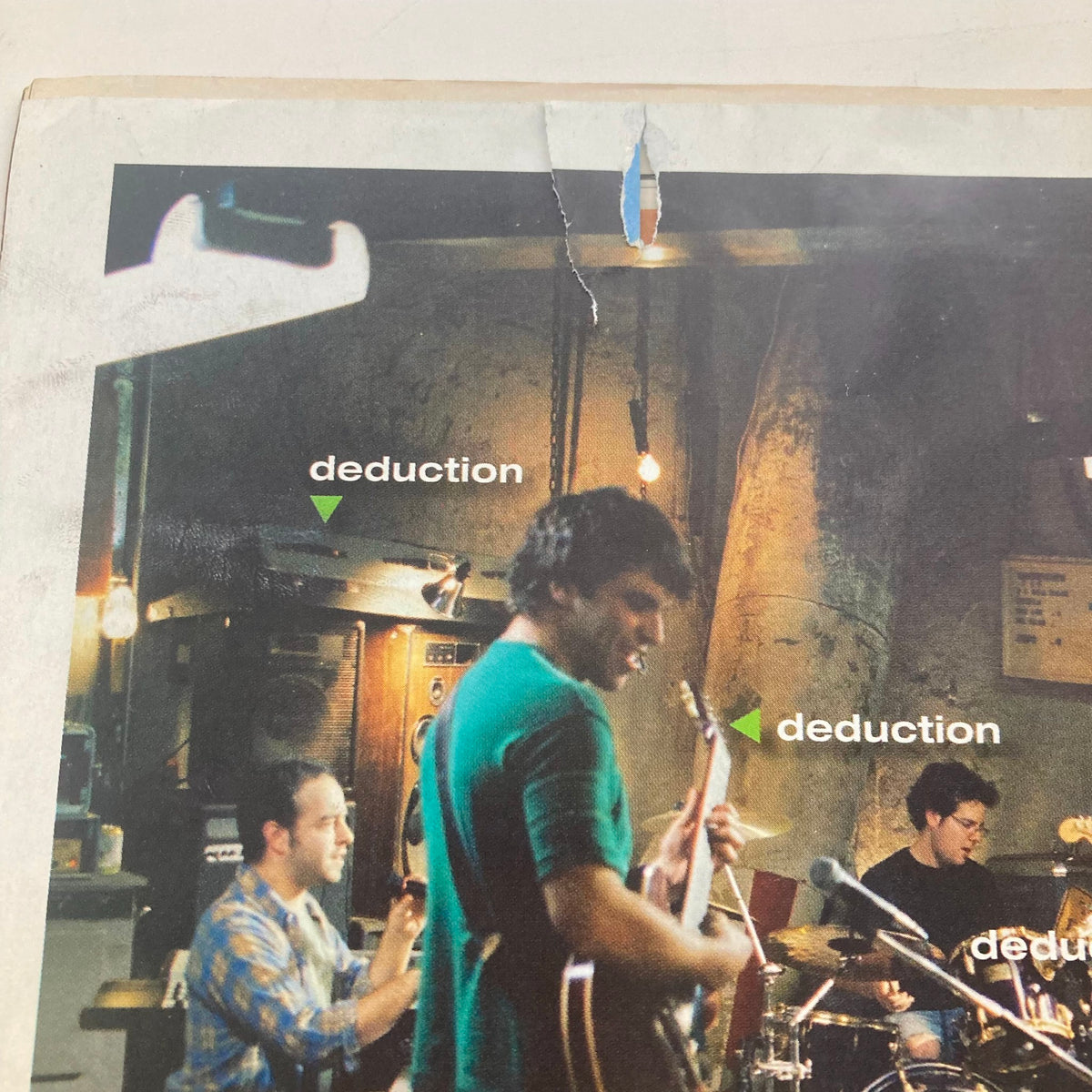 Rolling Stone Magazine January 26 2006 Issue 992 depicting a band performing in a dimly lit setting, highlighting the dedication to music with musicians engaged in playing instruments, related to Neil Young's artistic influence.