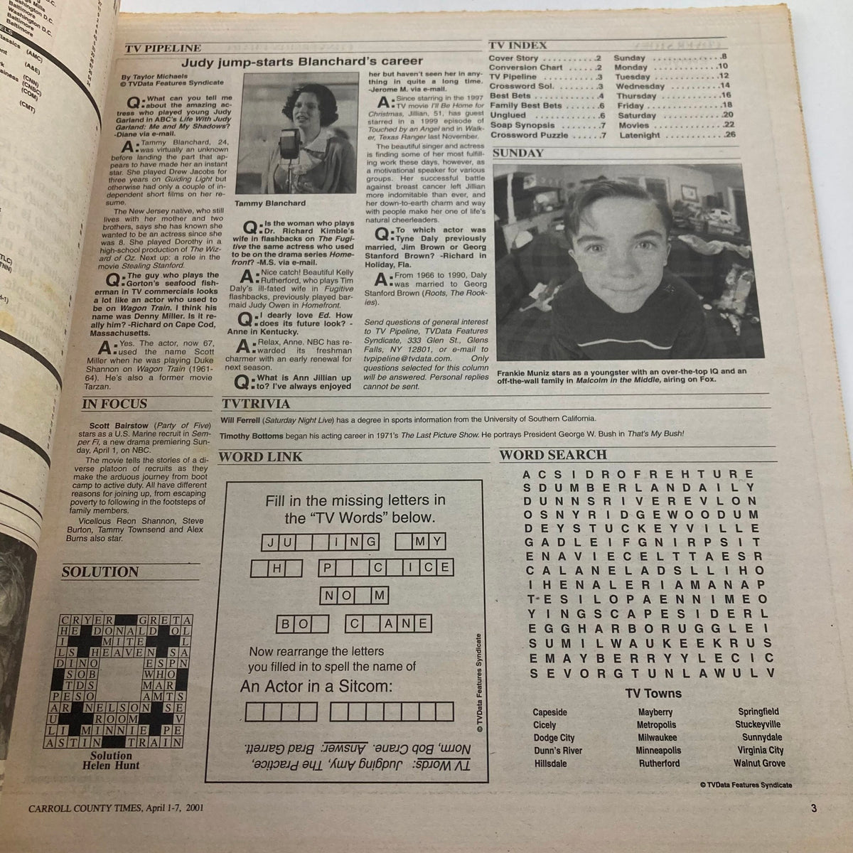 TV Week Magazine April 1 2001 featuring Judy, Tommy Burchfield and a crossword puzzle, showcasing TV highlights and cultural content.
