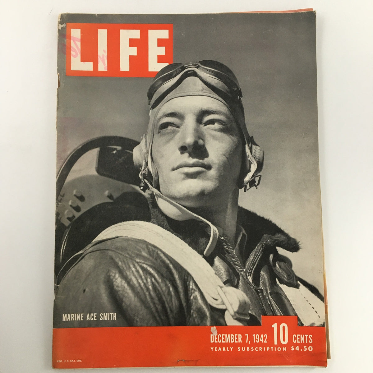 Cover of VTG Life Magazine December 7 1942 featuring Marine Ace Smith, showcasing a striking black and white portrait of the esteemed World War II pilot.