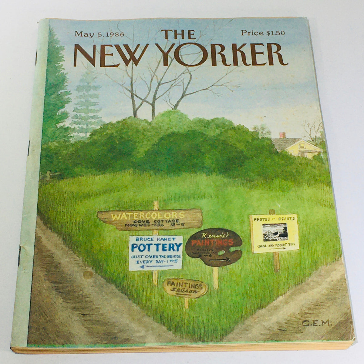 The New Yorker May 5 1986 magazine cover featuring a scenic illustration with signs for 'Watercolors,' 'Pottery,' and 'Paintings Salon,' reflecting mid-1980s artistic culture.