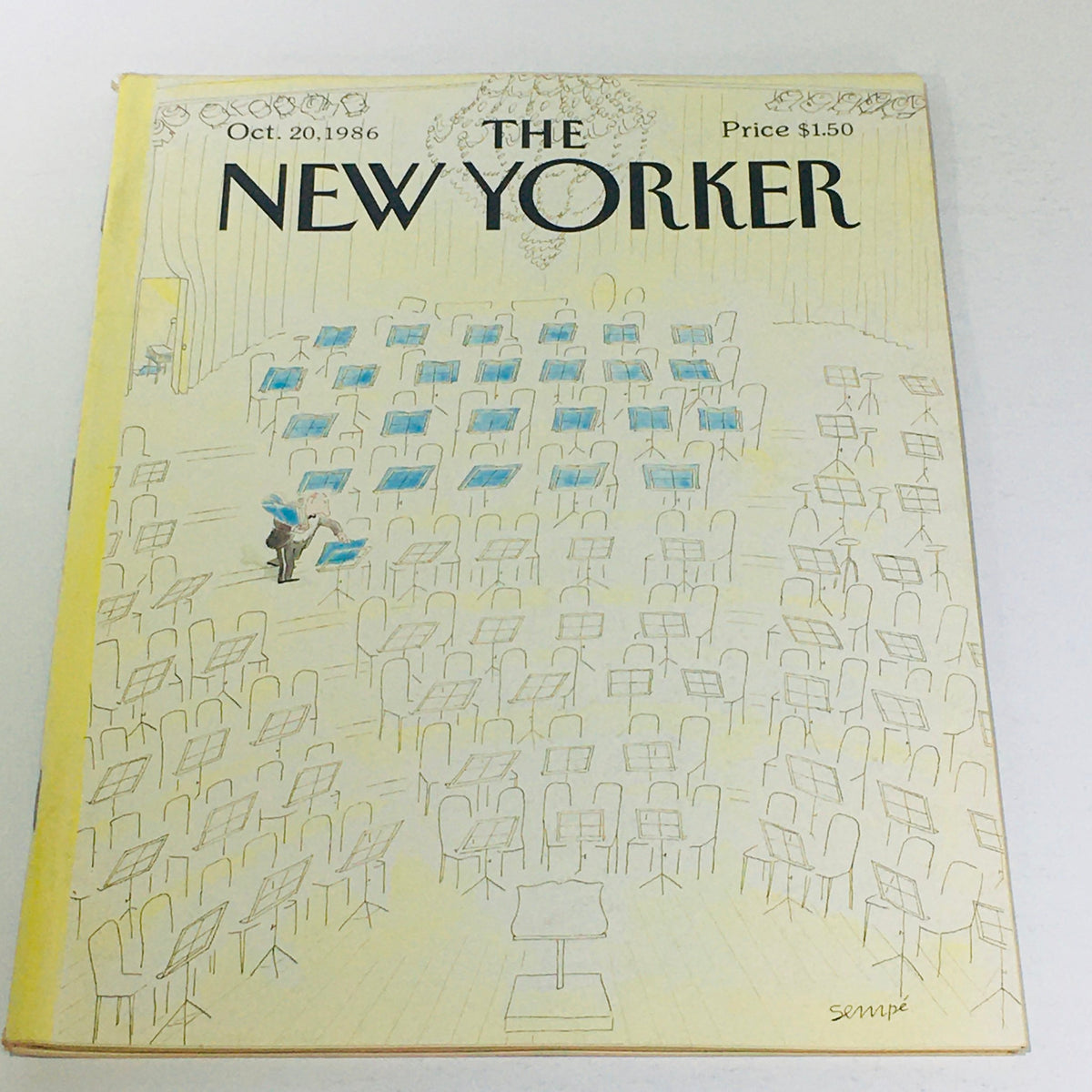 Cover of The New Yorker, October 20, 1986, featuring an illustration by Jean-Jacques Sempe depicting an empty concert hall with music stands, showcasing the magazine's artistic style.