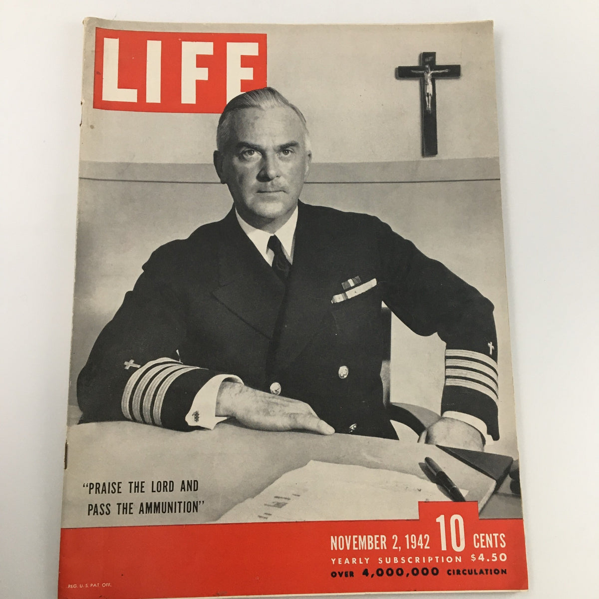 Cover of VTG Life Magazine, November 2, 1942, featuring the headline "Praise the Lord, Pass the Ammunition", showcasing a naval officer in uniform, symbolizing wartime resilience. This historic issue captures American culture during World War II.
