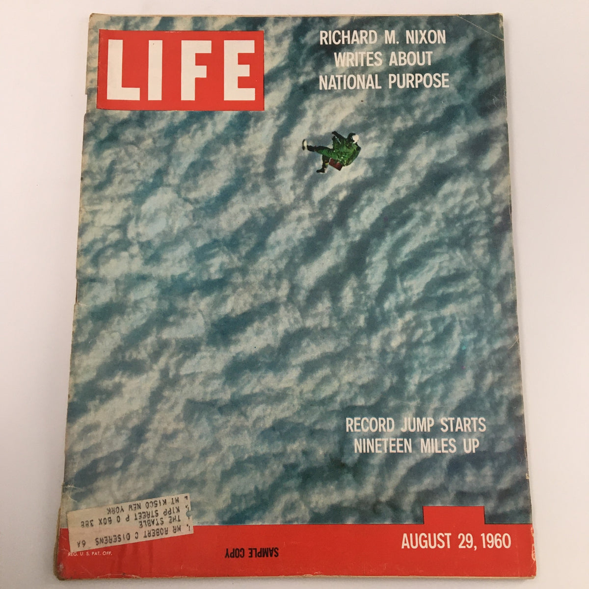 Vintage Life Magazine from August 29, 1960 featuring Richard Nixon's article about National Purpose, showcasing a captivating cover image with clouds and a parachutist. This collectible magazine reflects the political landscape of 1960s America.