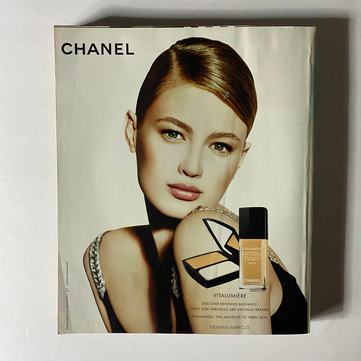 Chanel Vitalumiere makeup advertisement from InStyle Magazine September 2005, featuring a model highlighting skin radiance and beauty, representing iconic makeup trends of the early 2000s.