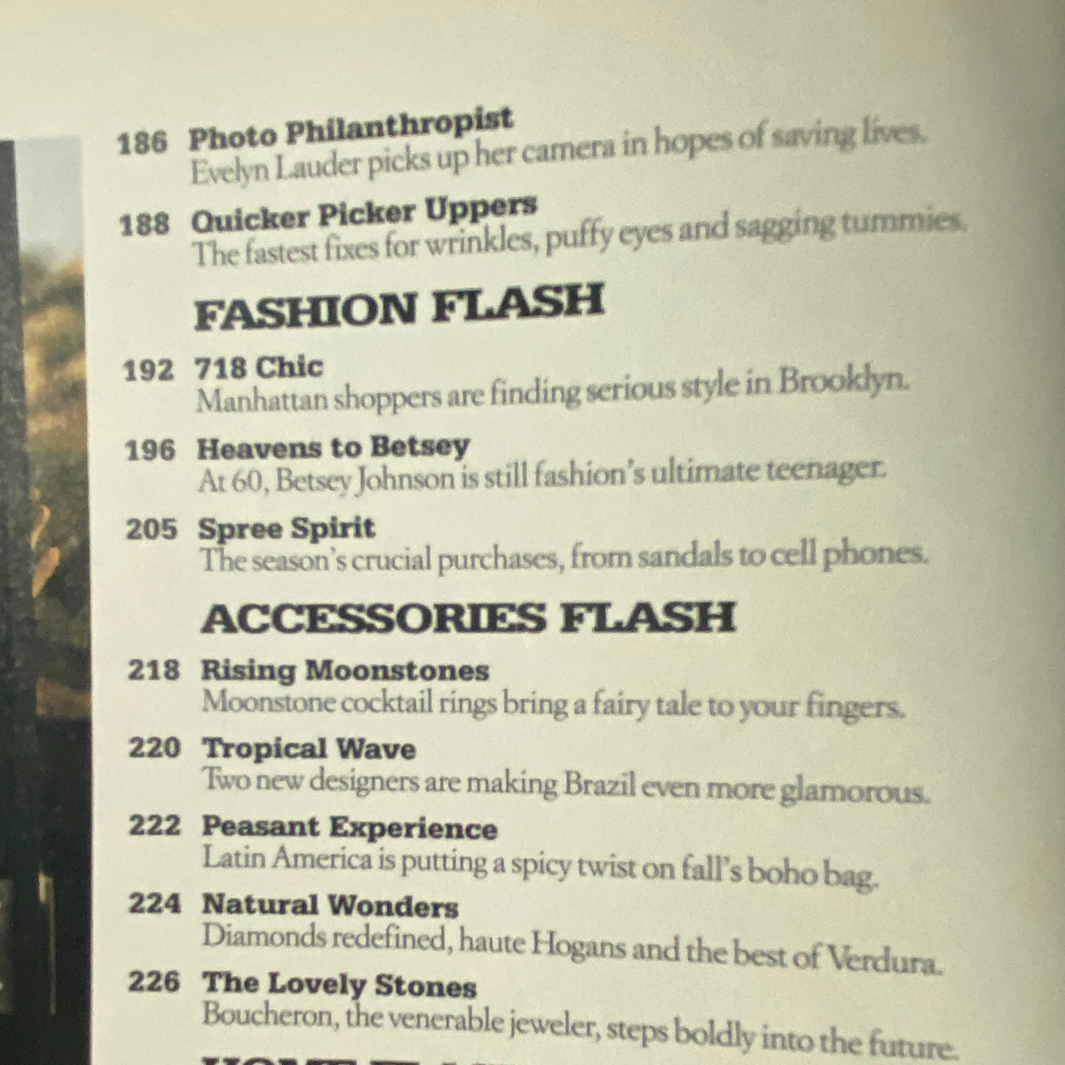 A close-up of the content page from W Magazine October 2002, highlighting various fashion articles, including '718 Chic' and 'Heavens to Betsey', reflecting the fashion trends of the time.
