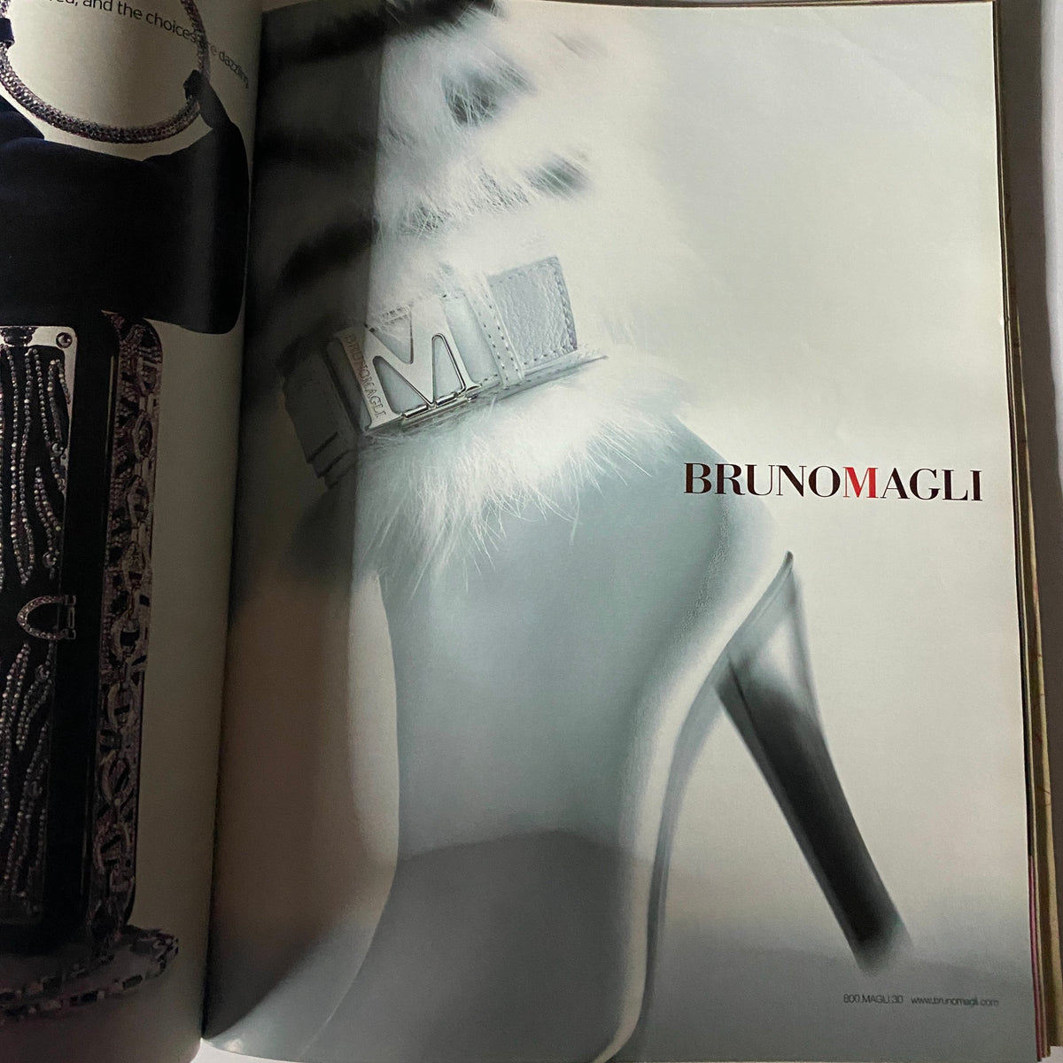 Bruno Magli advertisement featuring an elegant high heel shoe from W Magazine September 2004, showcasing premium fashion and design.