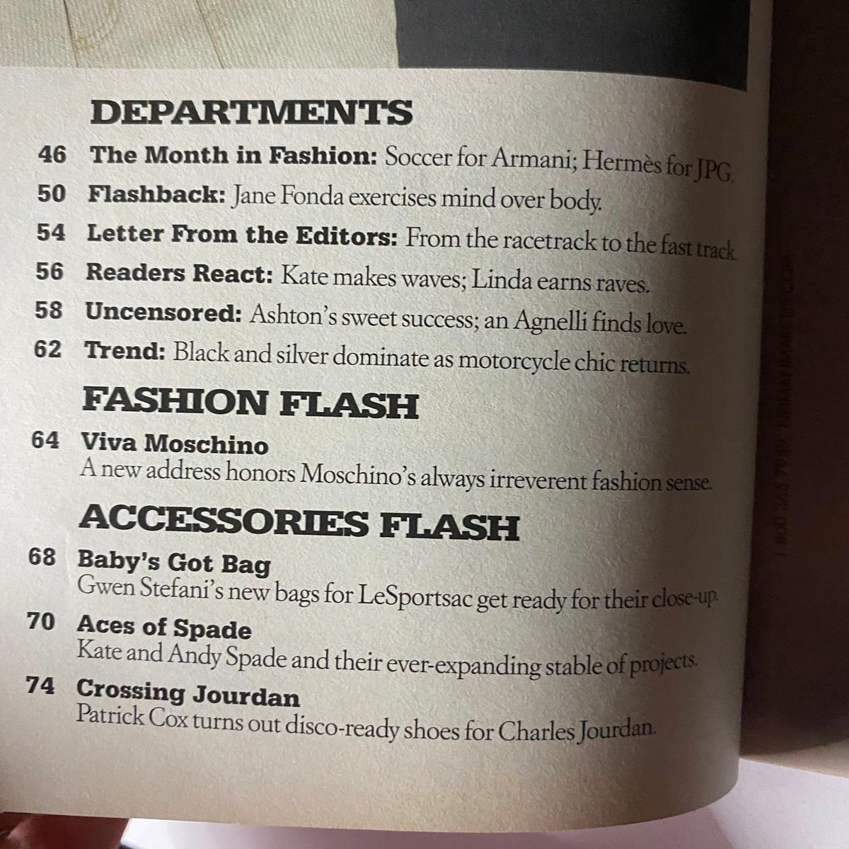 W Magazine August 2003 featuring articles on fashion trends, including 'The Month in Fashion' highlighting soccer for Armani and Hermès.