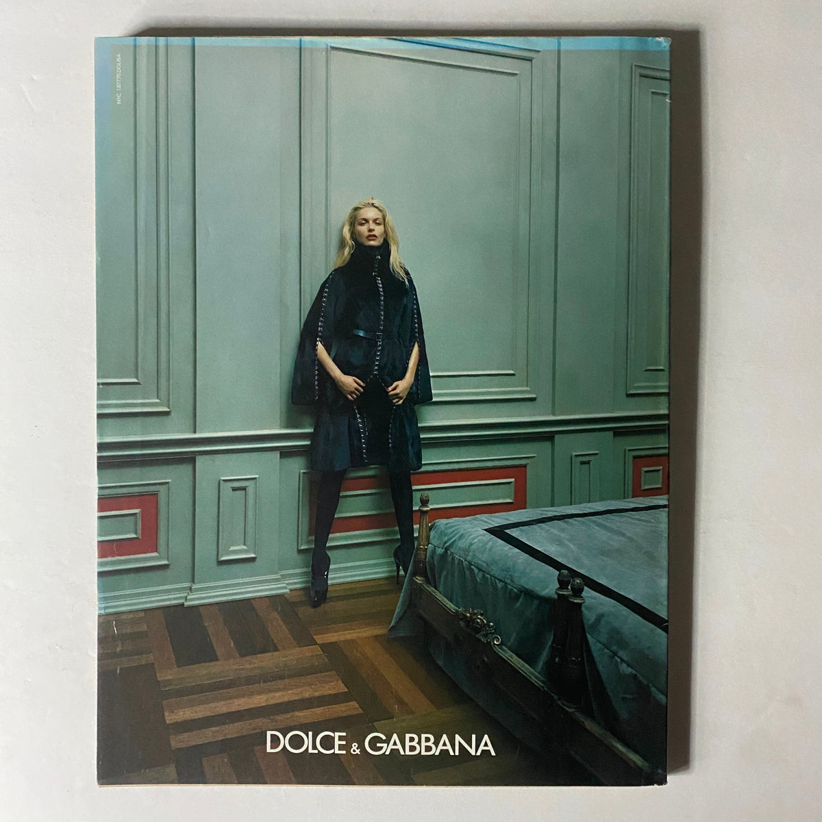 W Magazine August 2003 displaying a striking advertisement for Dolce & Gabbana, illustrating luxury fashion aesthetics.
