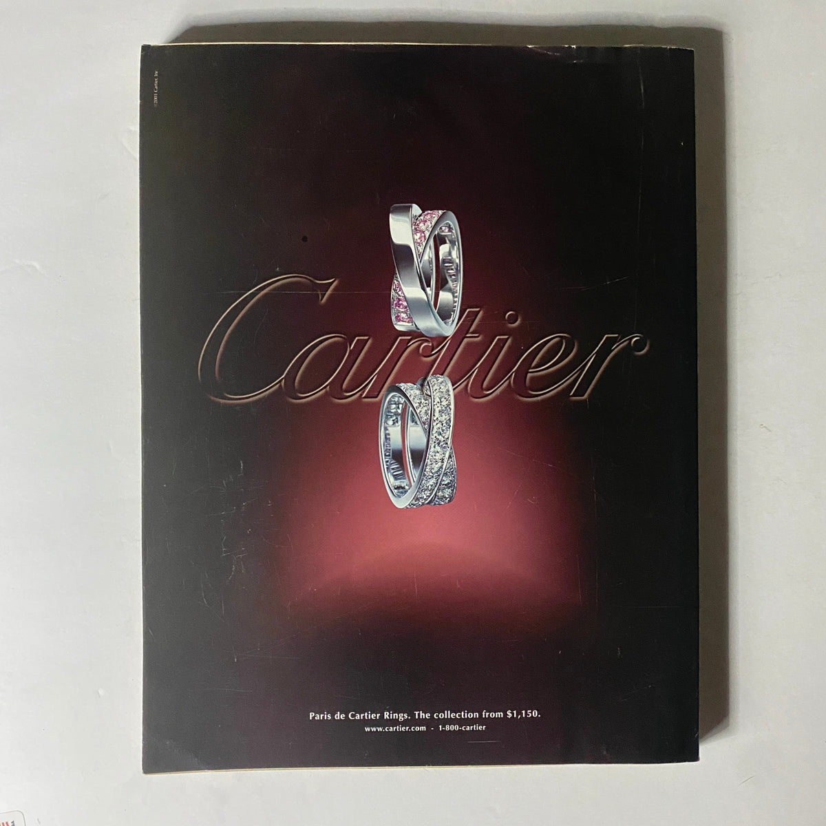 W Magazine November 2001 Liv Tyler Cover No Label, including a luxurious advertisement for Cartier rings highlighting exquisite design against a rich backdrop.