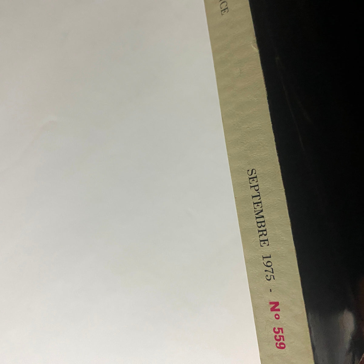 Vogue Paris Magazine September 1975 spine detail showcasing the publication date and issue number, emphasizing its vintage appeal.