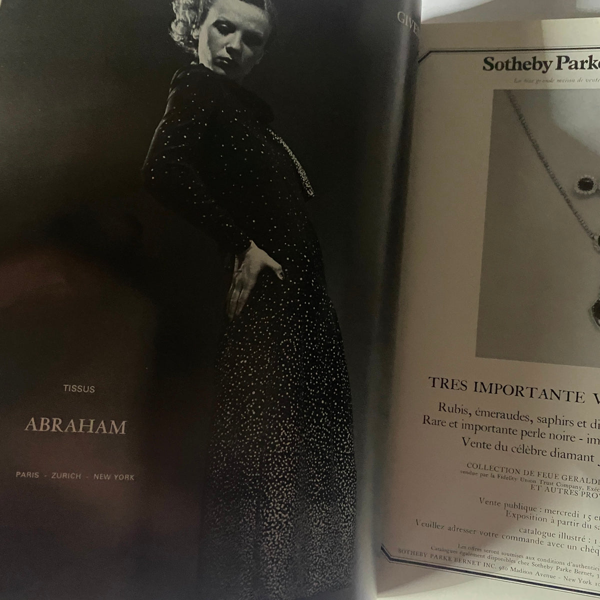 An iconic fashion spread from Vogue Paris Magazine September 1975 featuring a model in an elegant dress with a focus on sophisticated design and style.