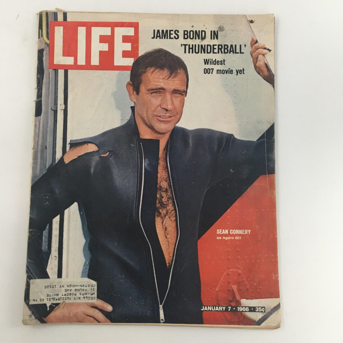 VTG Life Magazine January 7, 1966 featuring Sean Connery as Agent 007 on the cover, depicting him in a black wetsuit with a partially unzipped design and showing a confident pose.