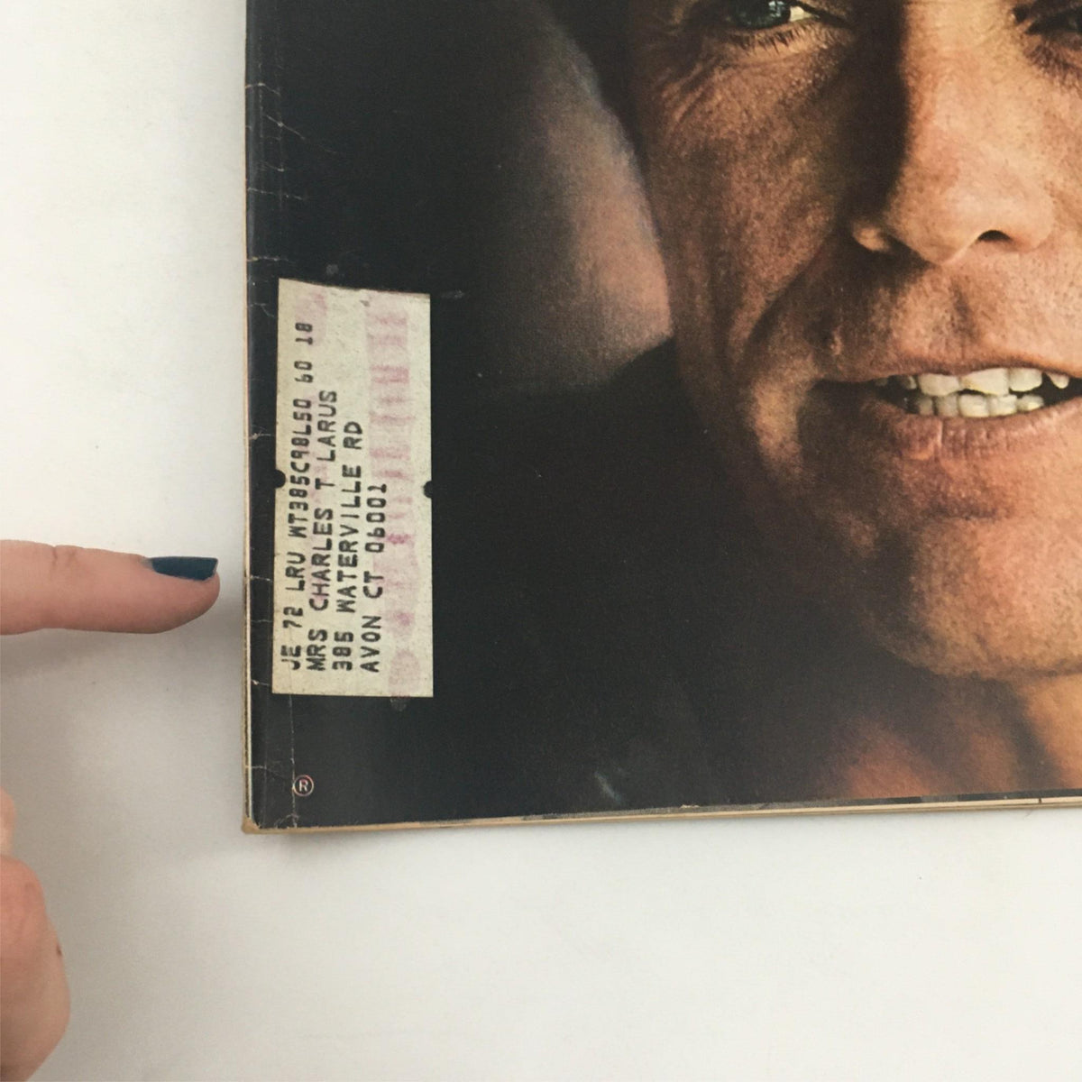 Close-up image of Life Magazine's July 23, 1971, cover featuring Clint Eastwood, with an address label visible on the left side, emphasizing the magazine's vintage character.