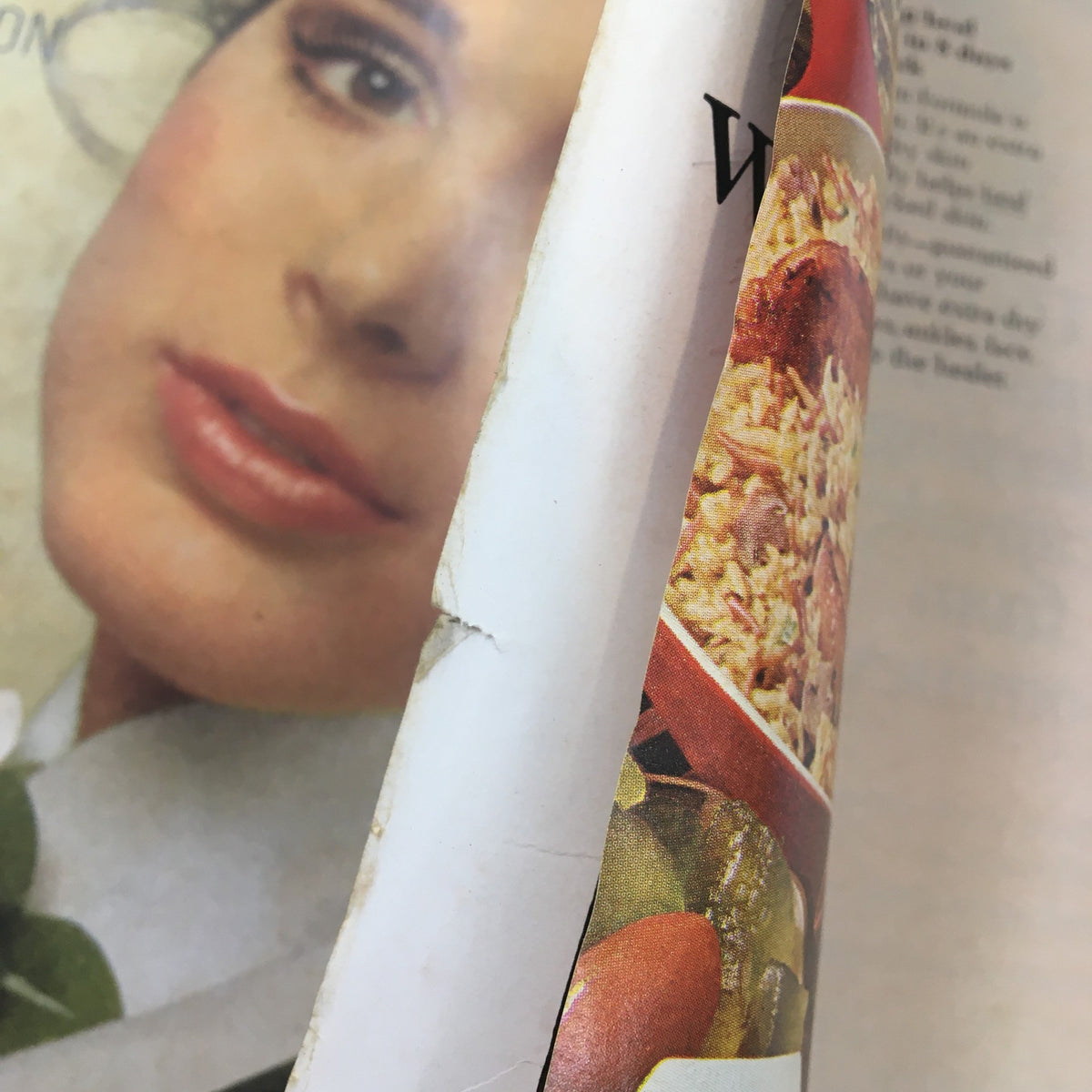 An interior view of the VTG McCall's Magazine February 1969, showing the magazine's spine and some wear, signifying its age while featuring content related to Jessamyn West and American cultural context.