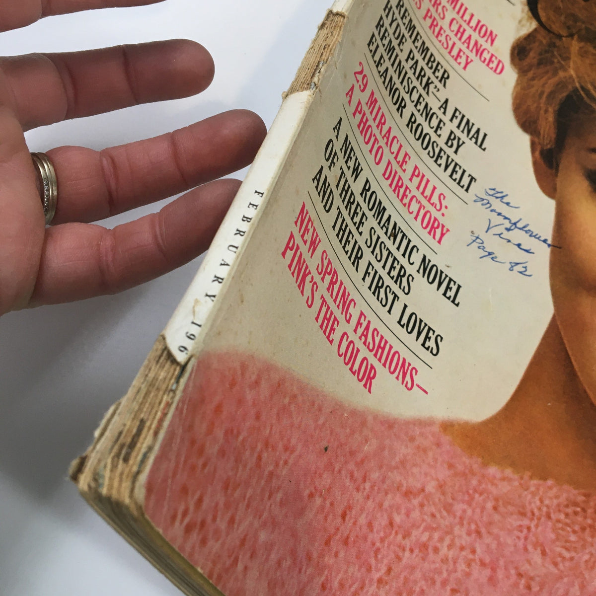 Side view of the spine of VTG McCall's Magazine February 1963, highlighting the vintage condition and the article 'How 10 Million Dollars Changed Elvis Presley'.